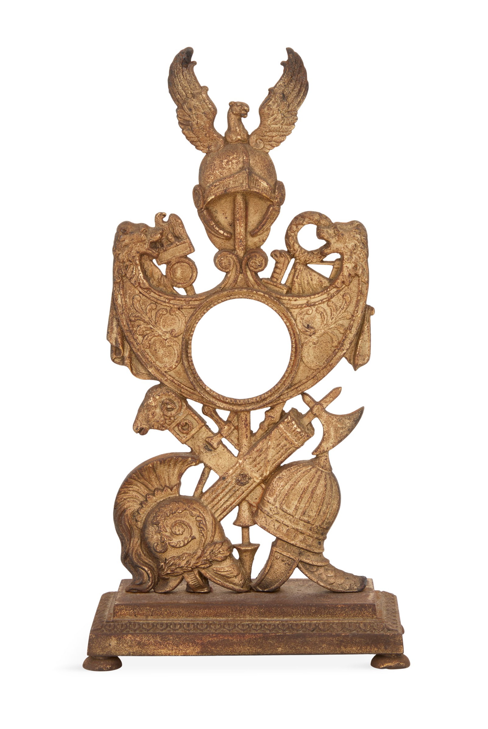 Gilt-Metal Watch Stand in the Neoclassical Taste: Gilt-Metal Watch Stand in the Neoclassical Taste 19th century, decorated with war trophies and a winged helmet on the crest. h. 10-1/4", w. 5-1/2", d. 2-1/2" Provenance: Kevin Stone Antiques, The