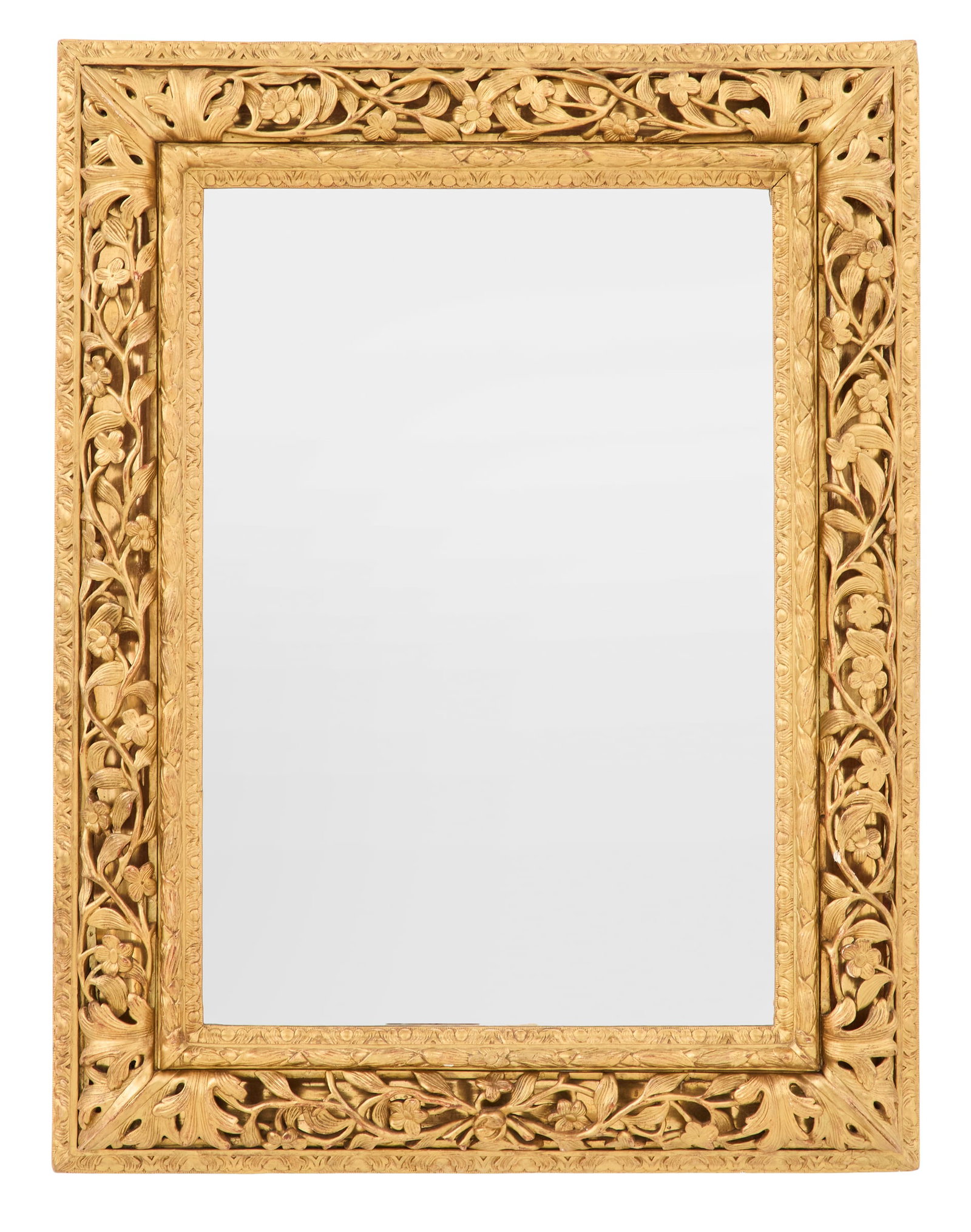 Unusual Italian Giltwood Cushion Mirror: Unusual Italian Giltwood Cushion Mirror 19th century, the pierced "cushion" carved with swirling vines and flowers, with a laurel-carved inner surround and a scroll-carved liner securing the mirror pl