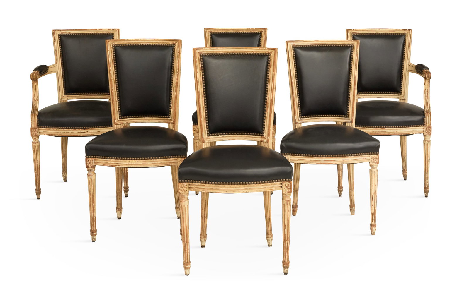 Six French Polychrome and Leather-Covered Chairs: Suite of Six French Polychrome and Leather-Covered Chairs 19th century, in the Directoire taste, the suite including two armchairs and four side chairs, each with a molded frame and raised on turned a