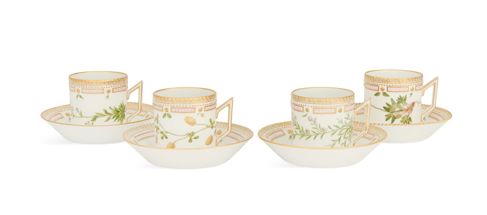 Four "Flora Danica" Chocolate Cup and Saucer Sets: Four Royal Copenhagen "Flora Danica" Porcelain Chocolate Cup and Smooth Saucer Sets 1950s-60, the cups model 3513, depicting assorted botanicals together with smooth saucers having outward-flared side