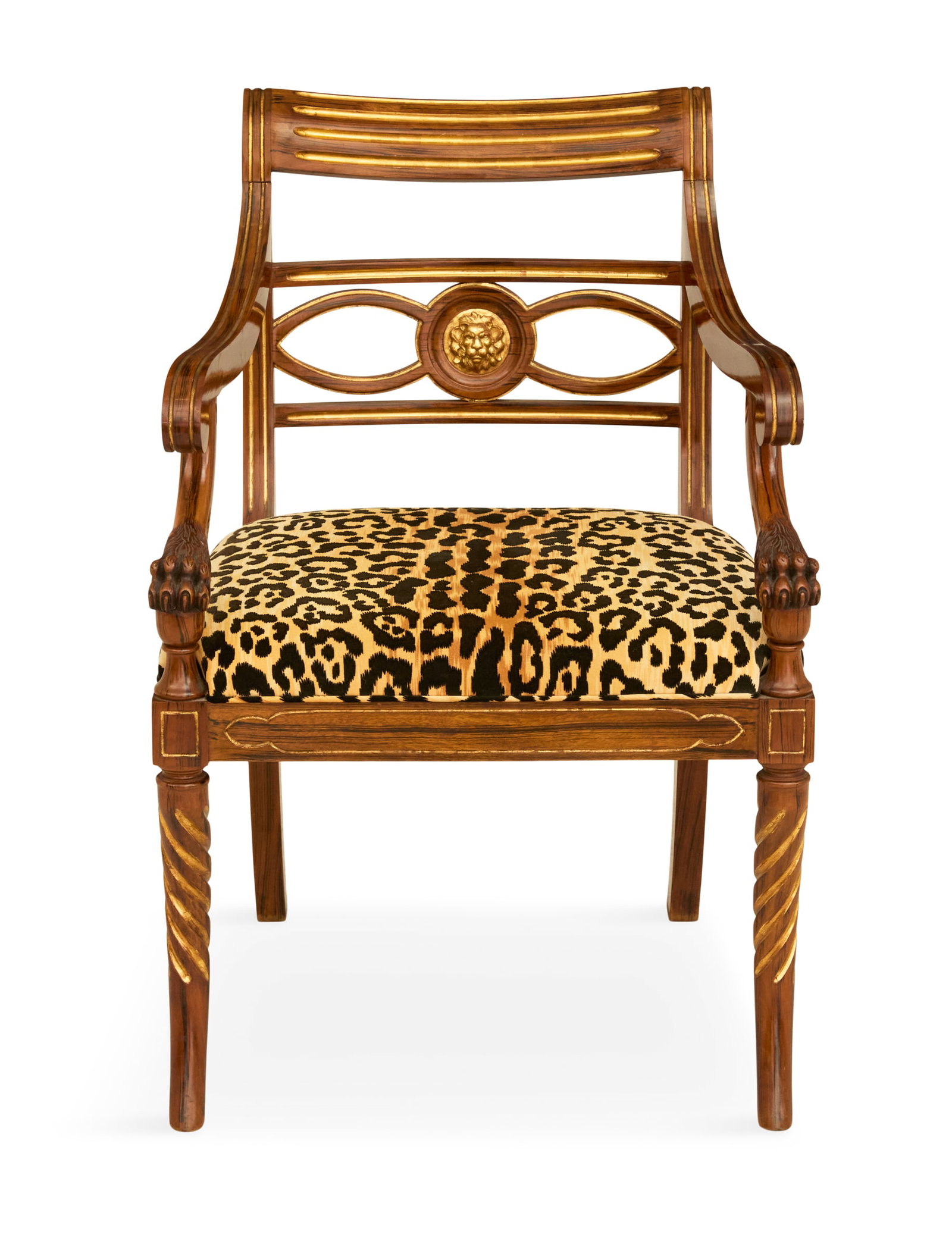 Regency Parcel-Gilt Rosewood Armchair: Regency Parcel-Gilt Rosewood Armchair 19th century, the back with a medial slat centered by a carved and gilt lion's masque, the curved arm supports ending in carved lion's paws, the seat with a leopa