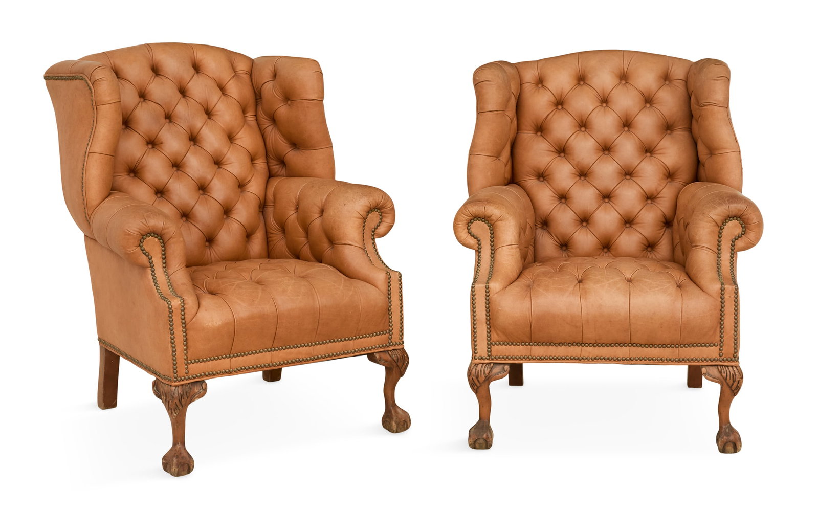 Pair of George III-Style Leather Wing Chairs: Pair of George III-Style Leather Wing Chairs 20th century, of traditional form with diamond-tufted backs, arms and seats, raised on cabriole legs ending in ball-and-claw feet. h. 42", seat h. 18", w. 
