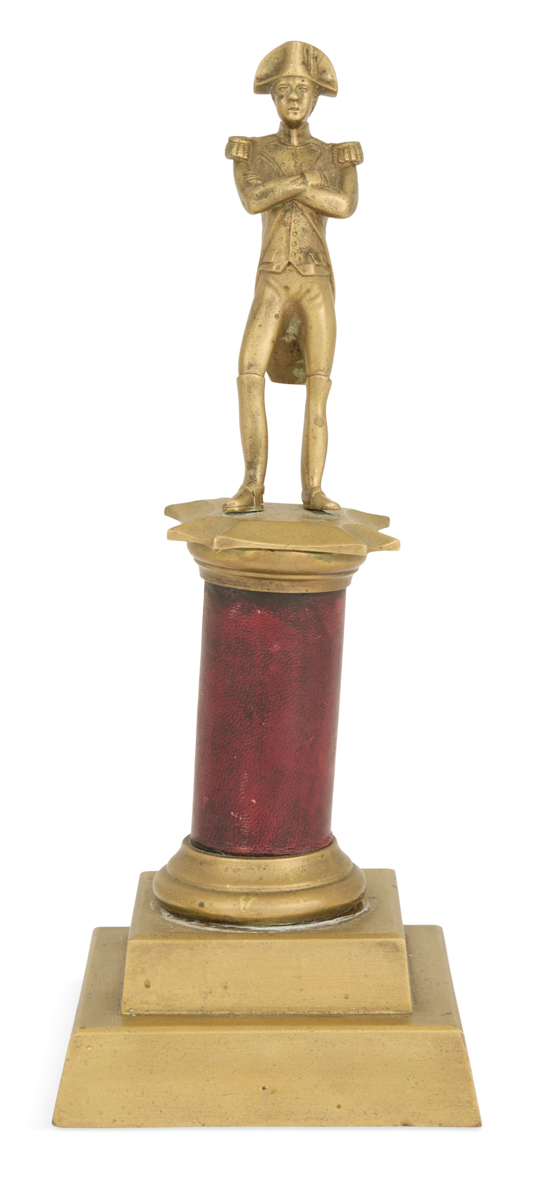 French Bronze Figure of Napoleon: French Bronze Figure of Napoleon ca. 1900, the figure standing on a red Morocco-clad column, raised on a stepped base. h. 12", w. 4-1/2", d. 4-1/2" Provenance: The Estate of Hamilton and Marjorie Perk