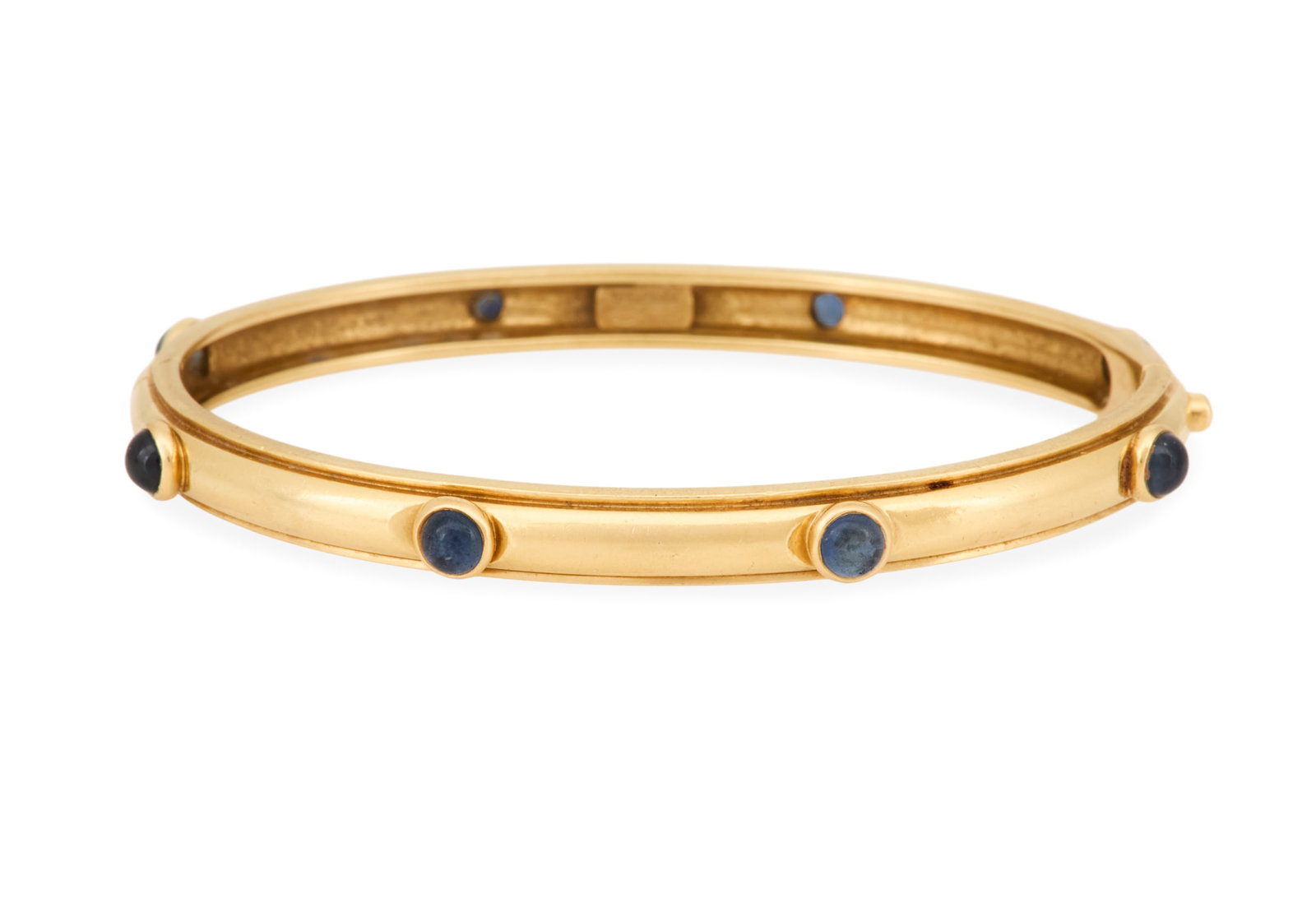 Tiffany & Co. Sapphire Bangle Bracelet: Tiffany & Co. Sapphire Bangle Bracelet 18k yellow gold, the hinged bracelet mounted with round sapphire cabochons weighing approximately 2.00 carats in total, stamped "TIFFANY & CO.". inside circumfer