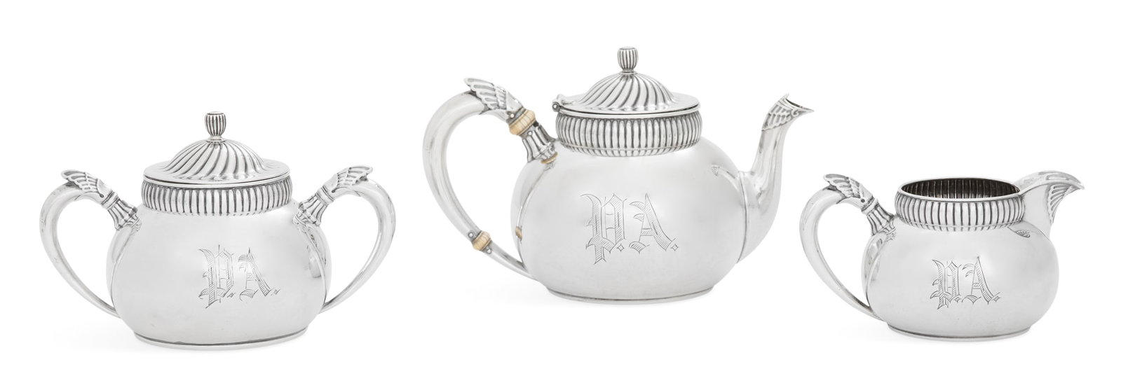 Gorham Sterling Silver Tea Set: Gorham Sterling Silver Tea Set 1888-1890, Providence, Rhode Island, including: a teapot, h. 5", dia. 5", l. 9"; a covered sugar bowl, h. 5-1/8", dia. 4-1/2", w. 7-1/2"; and a cream jug, h. 3-3/8", dia
