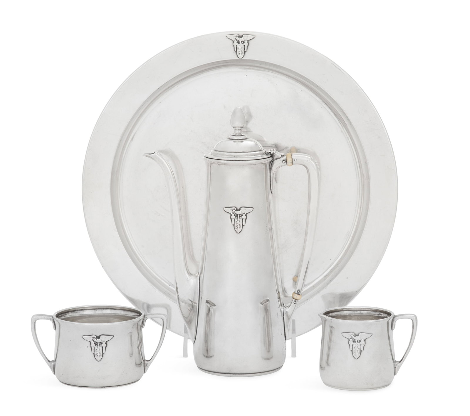 Tiffany & Co. Sterling Silver Demitasse Set: Tiffany & Co. Sterling Silver Demitasse Set the pattern introduced in 1915, this set dated 1925, New York, New York, including: a demitasse coffeepot, h. 8-3/4", l. 6"; an open sugar bowl, h. 2", w. 4