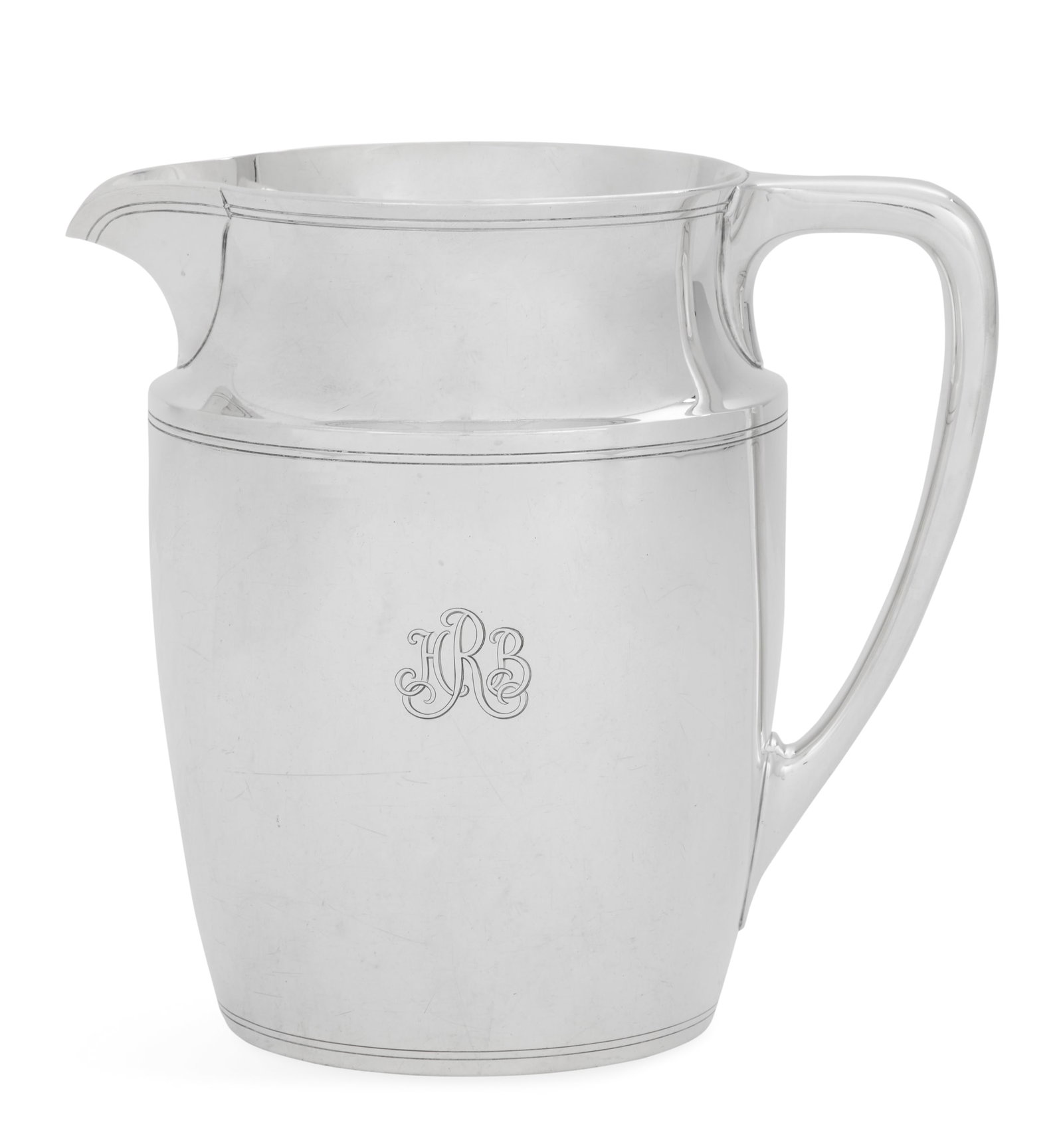 Tiffany & Co. Sterling Silver Water Pitcher: Tiffany & Co. Sterling Silver Water Pitcher the pattern introduced in 1923, New York, New York, the ovoid body with waisted collar, short curved spout and angled handle, decorated with incised threadi