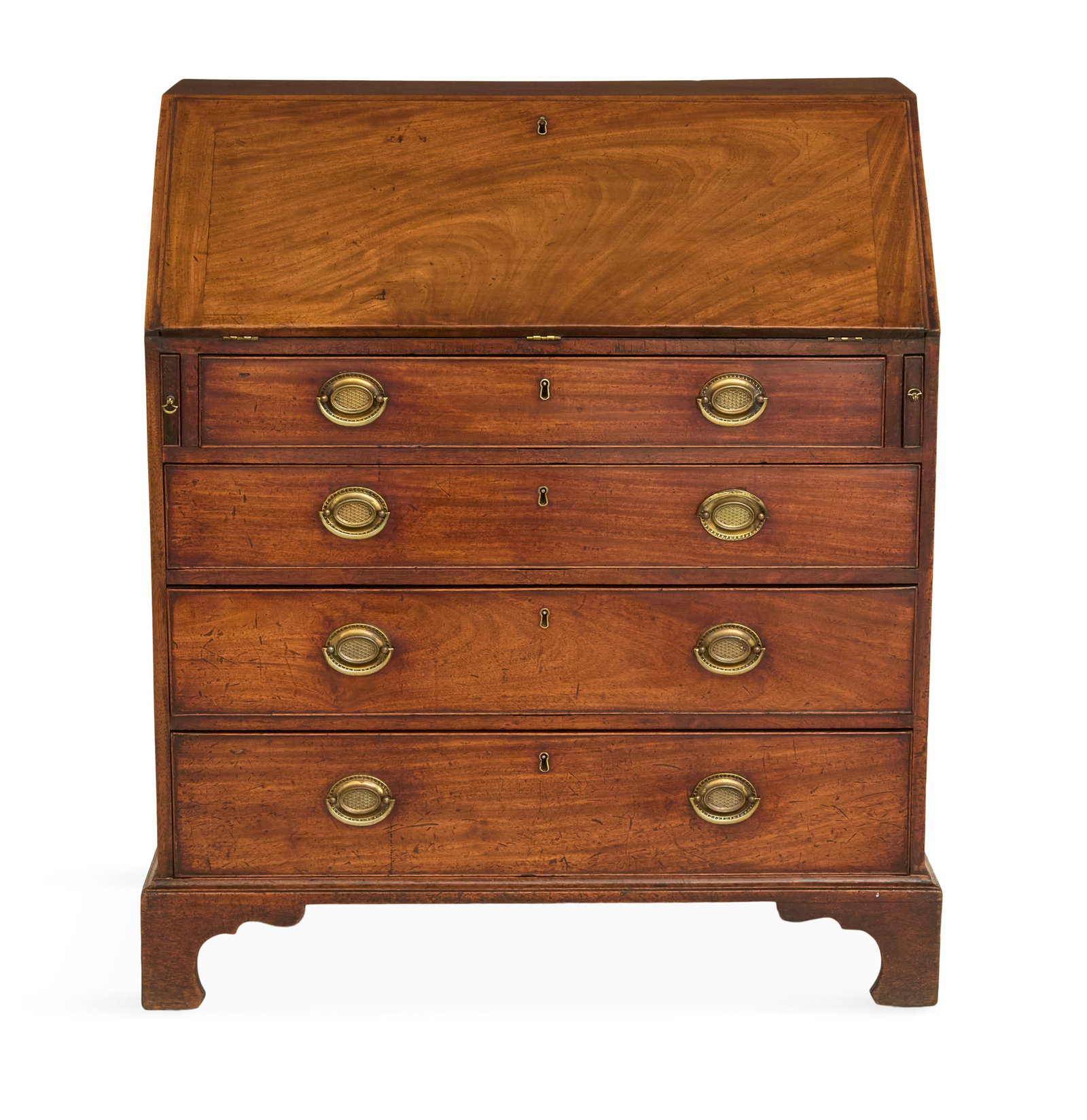 Early American Mahogany Slant-lid Desk: Early American Mahogany Slant-lid Desk 18th century, New England, the highly figured single-board drop-front lid opening to a fitted interior with a row of small drawers over a row of cubbies, above f