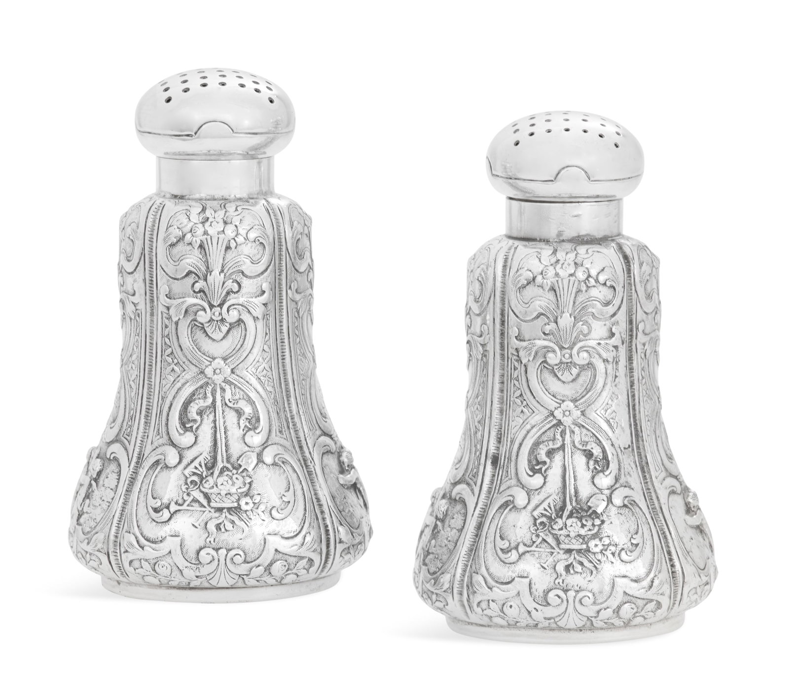 Pair of American Sterling Silver Casters: Pair of American Sterling Silver Casters second quarter 20th century, Marshall Field & Co., Chicago, Illinois, each of baluster form, decorated with four embossed panels of rococo scrolls above a vign