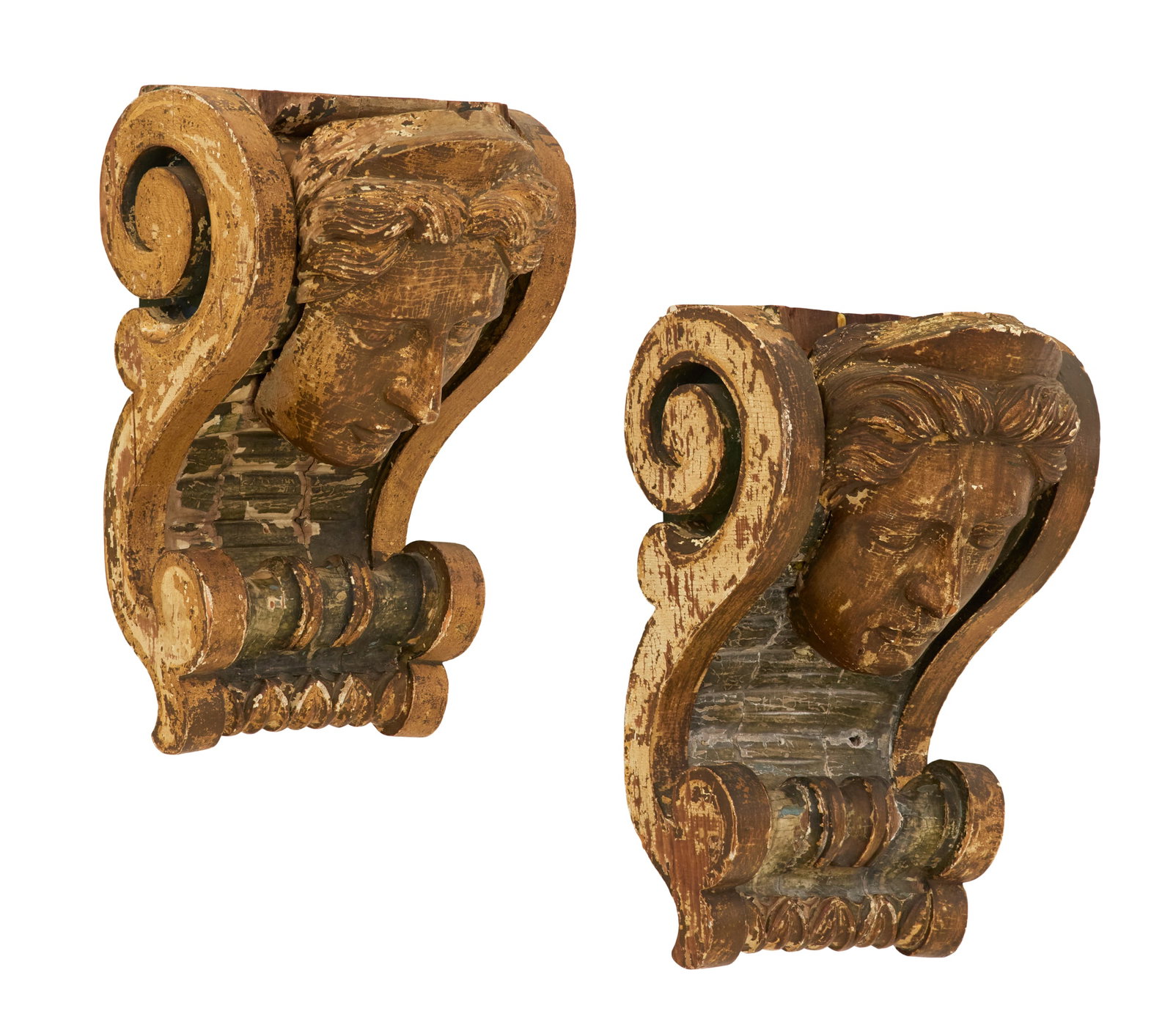 Pair of Carved Wood Architectural Brackets: Pair of Carved Wood Architectural Brackets third quarter 19th century, in the Neo-Grec taste, Charleston, South Carolina, each scrolled bracket carved with a masque of Diana. h. 18-1/2", w. 12", d.