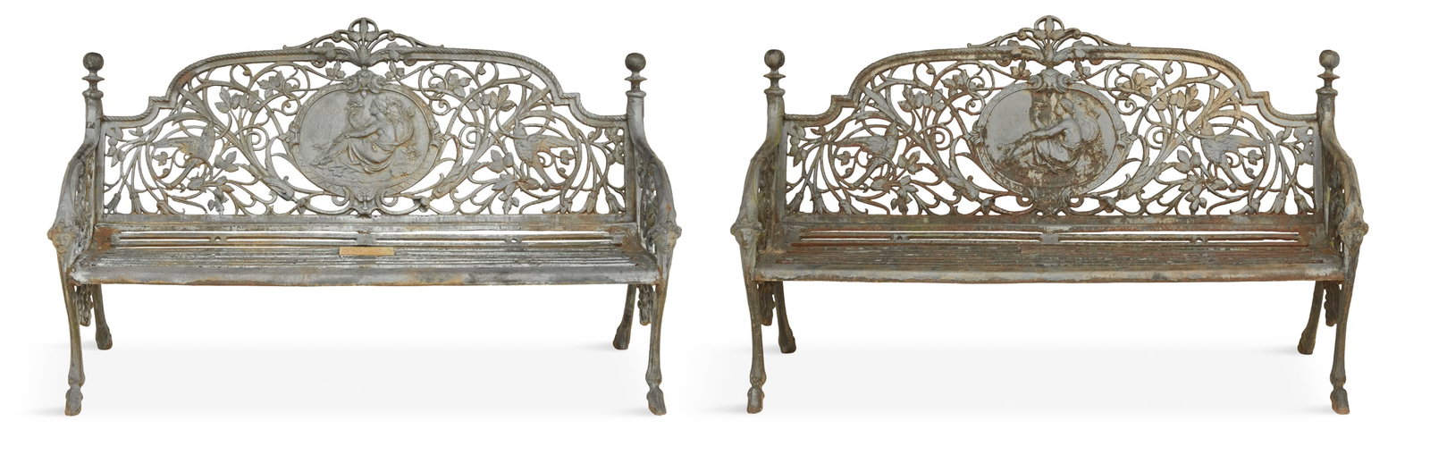 Pair of "Medallion" Pattern Cast-Iron Benches: Pair of "Medallion" Pattern Cast-Iron Benches 20th century, after Coalbrookdale, each having a back with an oval plaque with Venus holding a bird, against a field of swirling vines, flowers and