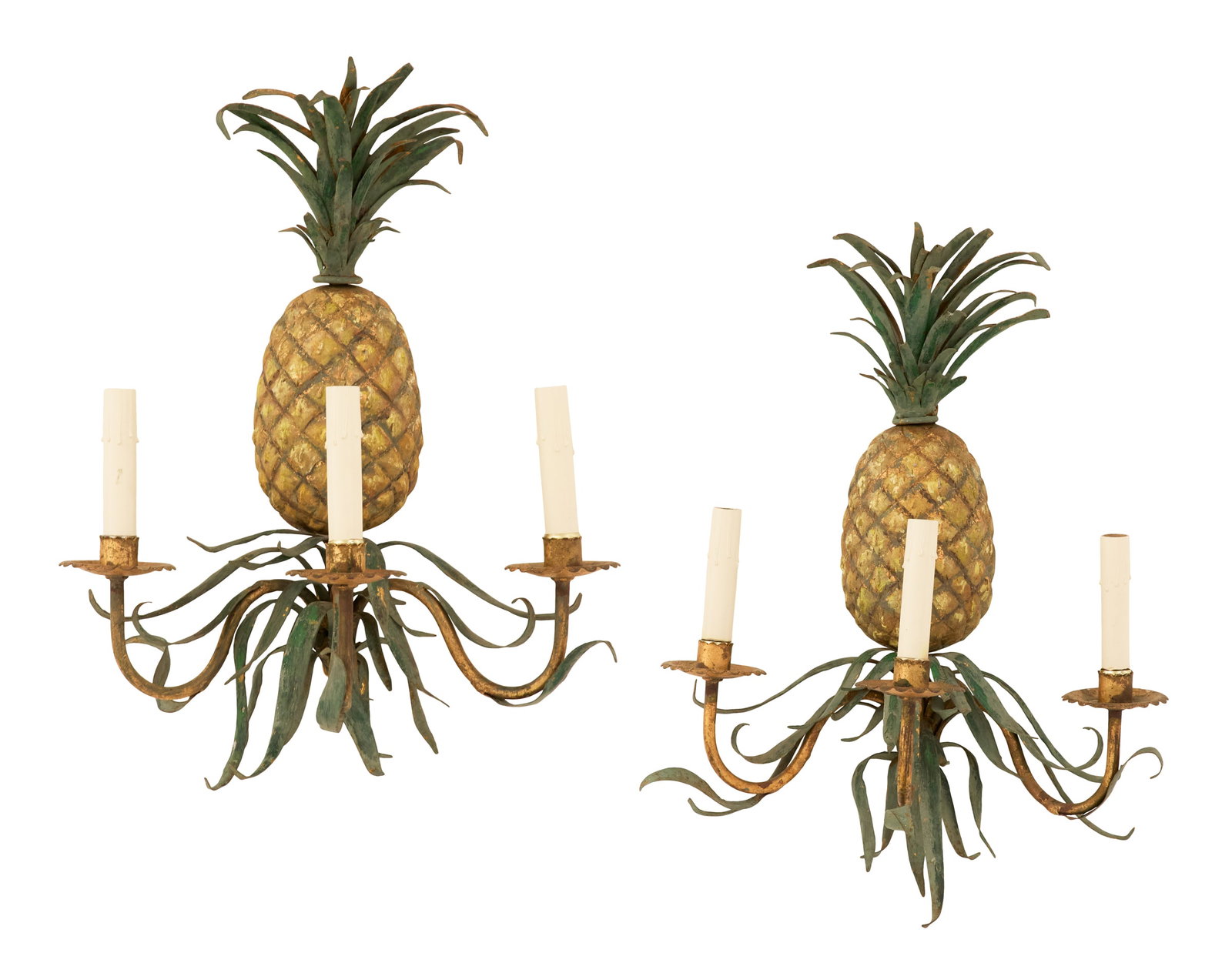 Pair of Italian Tole Pineapple Sconces: Pair of Italian Tole Pineapple Sconces third quarter 20th century, the bold pineapple backplates each set with three scrolled branches terminating in scalloped drip pans and cylindrical candle sockets