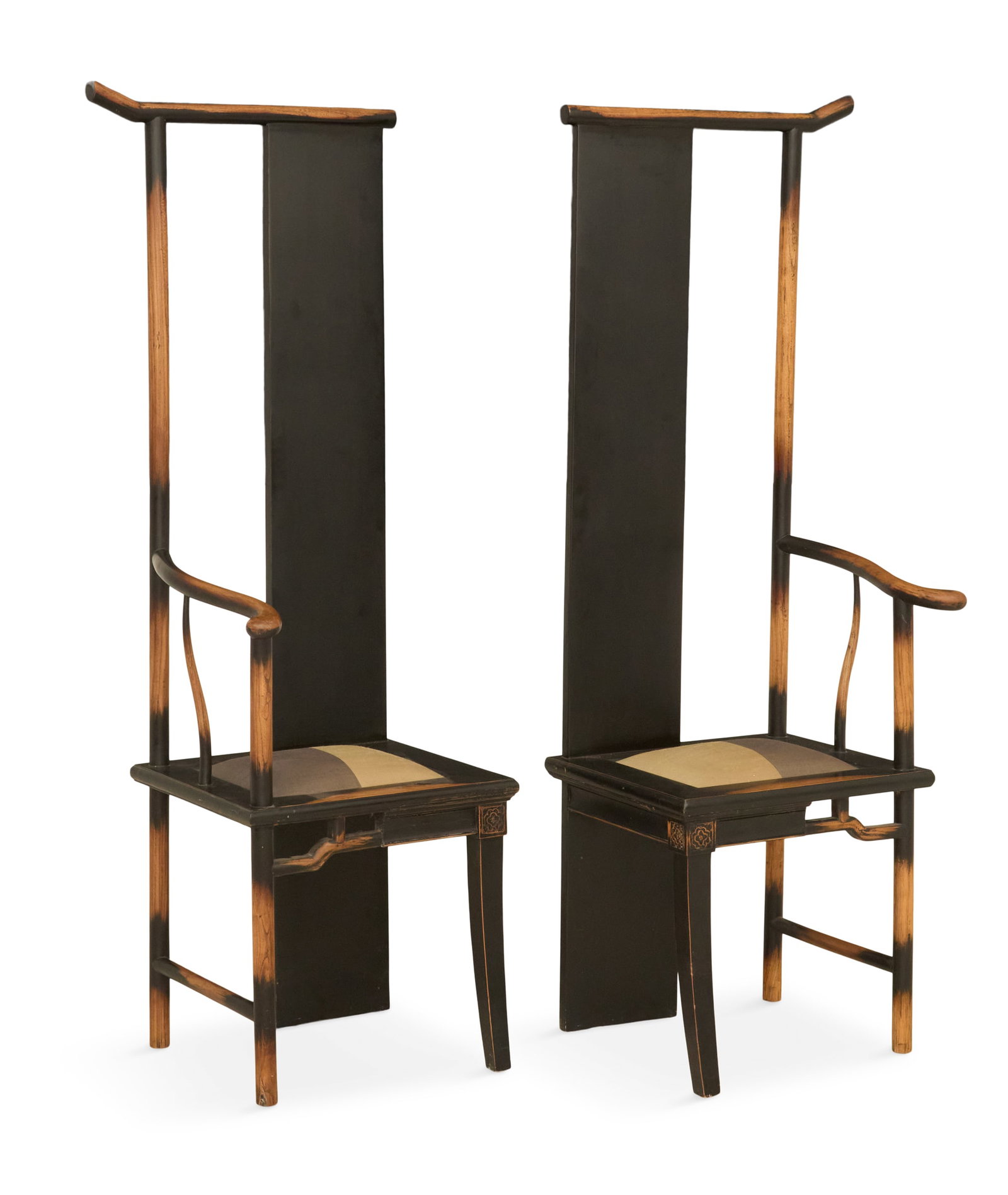 Pair of Chinese Elmwood Sculpted Armchairs: Pair of Chinese Elmwood Sculpted Armchairs attributed to Shao Fan (Chinese, b. 1964), the parcel-ebonized armchairs with tall backs with a single long panel, the framed seat with an inset cushion, the