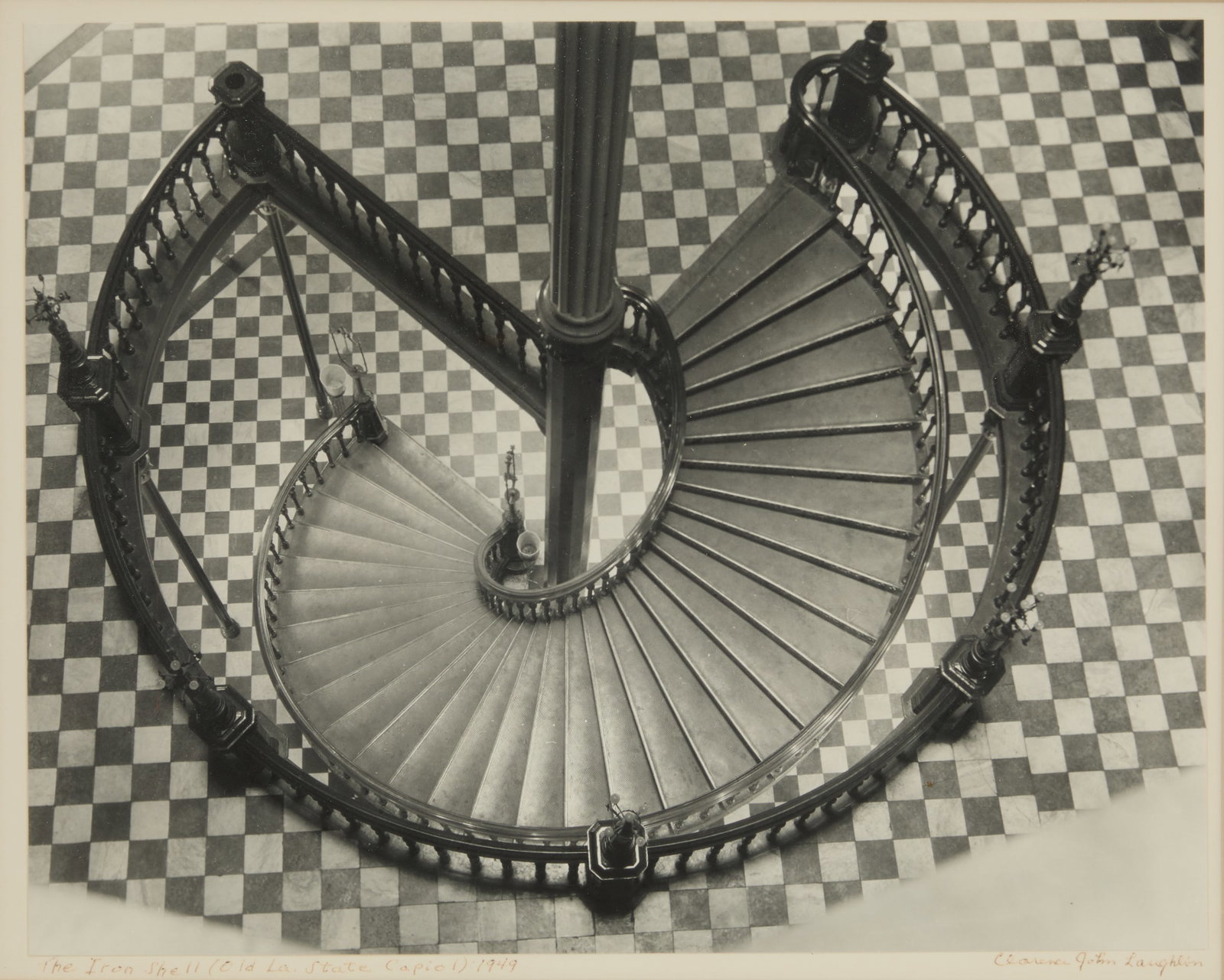Clarence John Laughlin (US/Louisiana, 1905-1985): Clarence John Laughlin (American/Louisiana, 1905-1985) "The Iron Shell: Old LA State Capitol, 1949" gelatin silver print signed lower right, dated and titled lower left. Float-mounted, glazed and