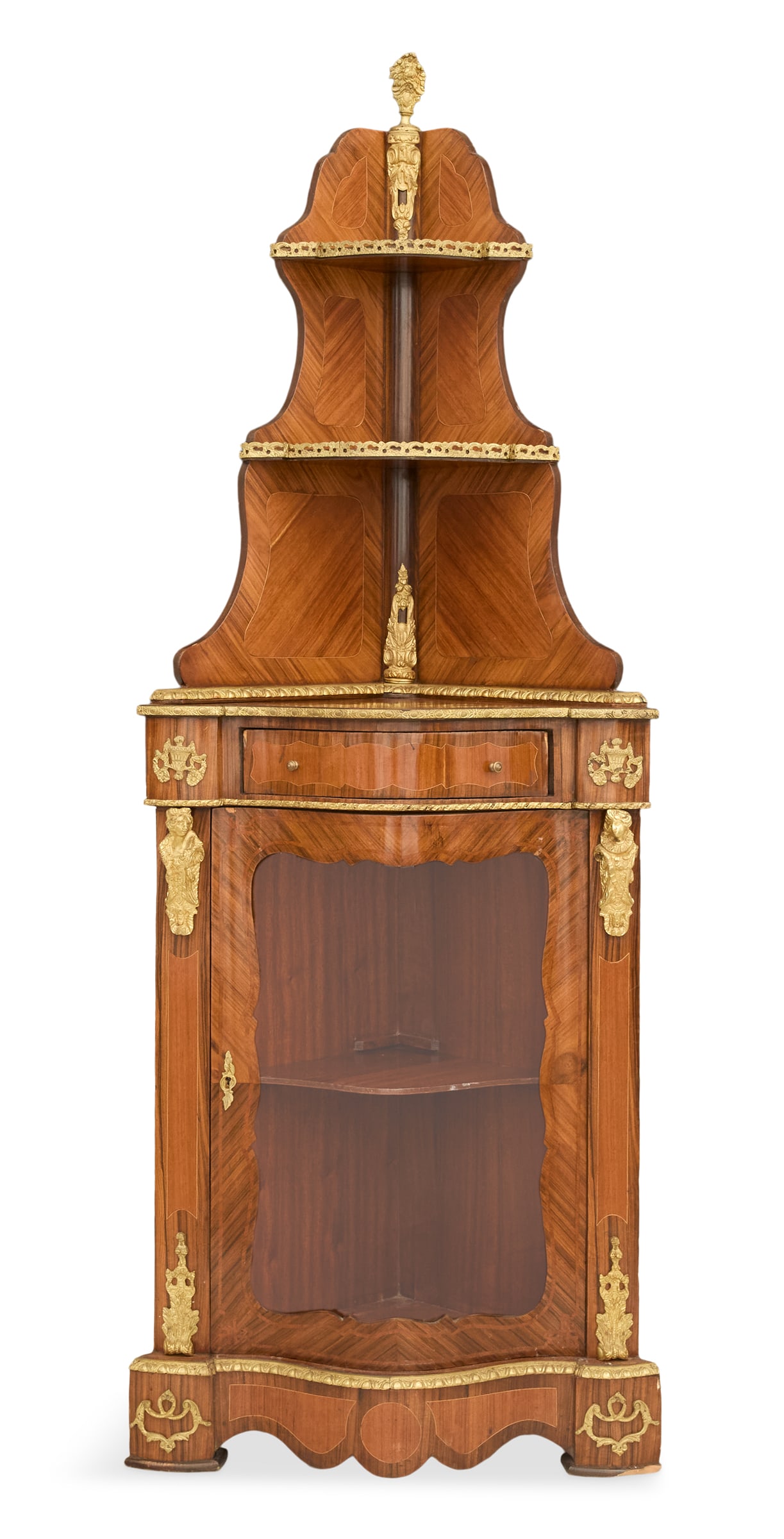 Napoleon III Kingwood Corner Vitrine: Napoleon III Kingwood Corner Vitrine 19th century, the upper section with two graduated shelves dressed with gilt-bronze mounts, the base with a drawer over a serpentine glazed door, on a scalloped ba