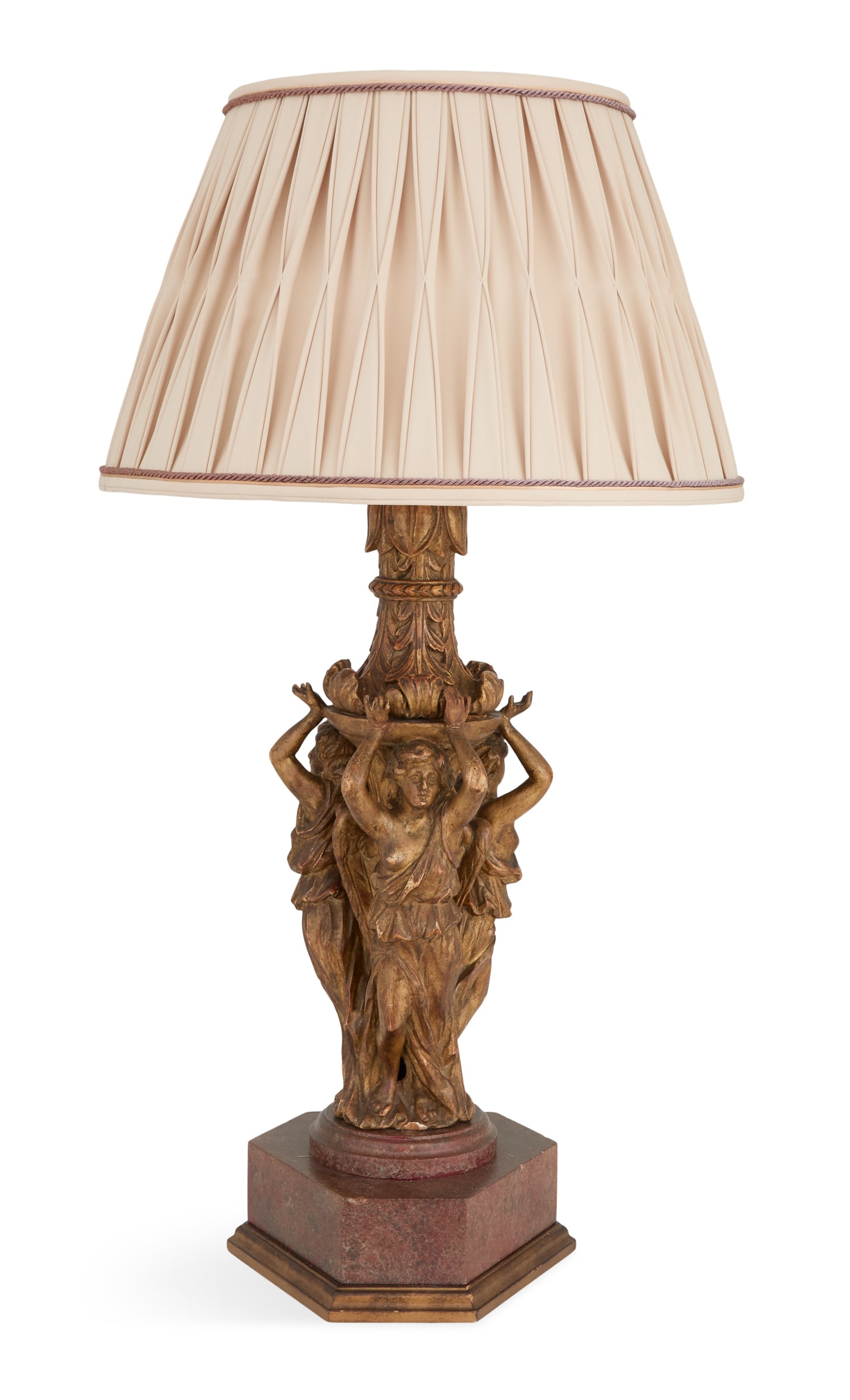 Carved Wooden "Three Graces" Table Lamp: Carved Wooden "Three Graces" Table Lamp 19th century and later, the standard carved with the "Three Graces" against acanthus leaf carvings, now mounted on a faux stone hexagonal base, fitted with a la