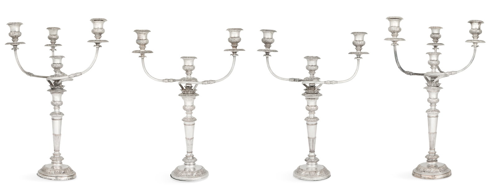 Four William IV Old Sheffield Plate Candelabra: Set of Four William IV Old Sheffield Plate Candelabra second quarter 19th century, each with a tapering standard gadrooned on the lower half, above a knopped base and surmounted by a thistle-form nozz