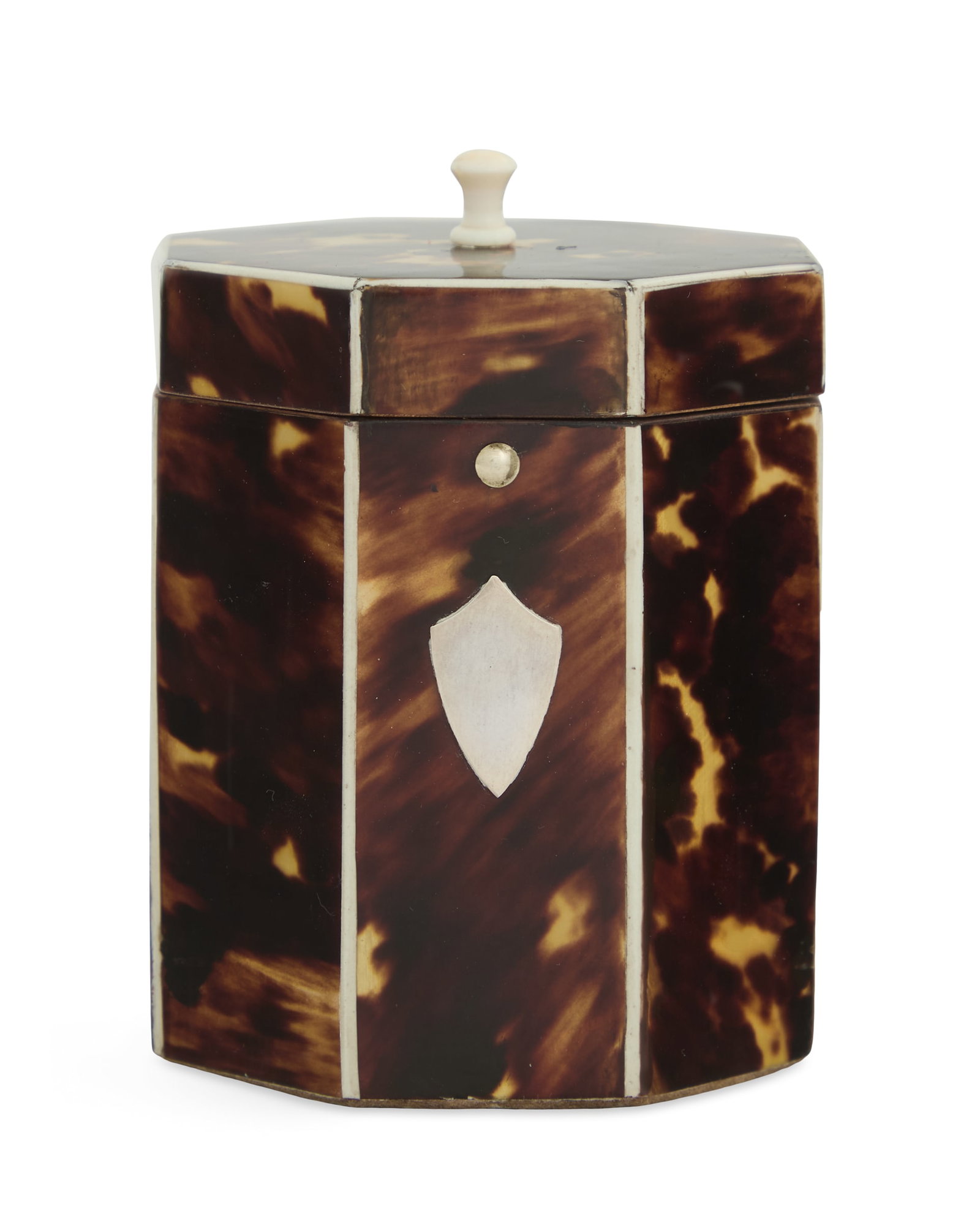 George III Octagonal Tea Caddy: George III Octagonal Tea Caddy ca. 1800, the facade with a shield-form monogram plaque, the interior with a cover, and now lined with marbleized paper. h. 3-3/4", dia. 3-1/4"
