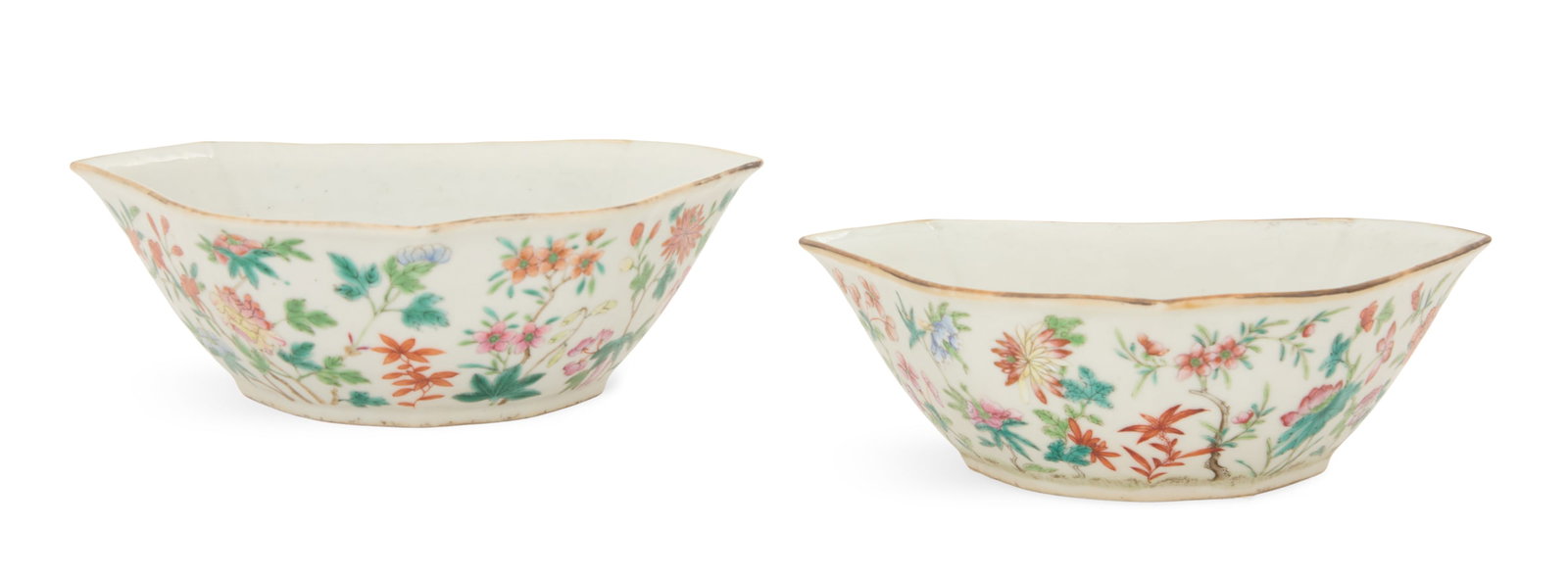 Pair of Chinese Famille Rose Bowls: Pair of Chinese Famille Rose Bowls ca. 1821-1850, the serpentine bowls decorated with scattered peonies, lotus blossoms and prunus branches, the bottoms with Tao Kuang seal marks. h. 2-3/4", w. 8", d.