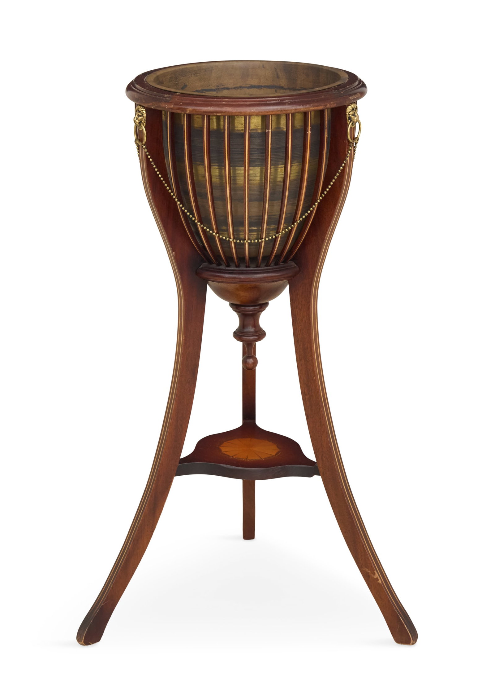 Regency-Style Mahogany and Brass Plant Stand: Regency-Style Mahogany and Brass Plant Stand mid-20th century, the circular mahogany top set with a brass plant holder and mounted with vertical inlaid stiles, the inlaid sabre legs set with brass lio