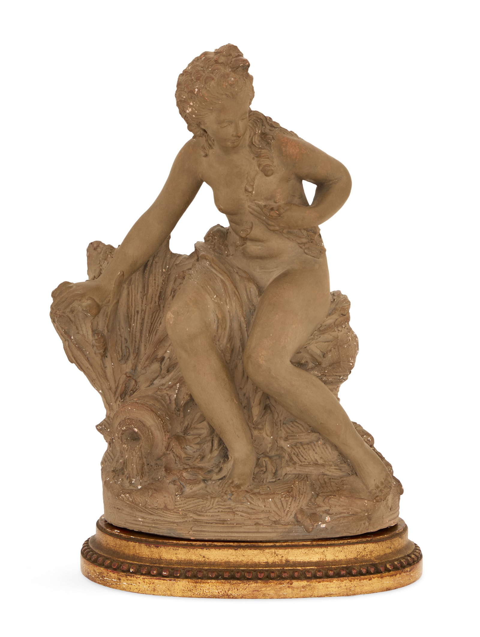 Belle Epoque Painted Terracotta Figure of Venus: Belle Epoque Painted Terracotta Figure of Venus fourth quarter 19th century, in the manner of Clodion, the figure partially draped, a water jug at her feet, on a beaded oval conforming base. h. 14-3/4