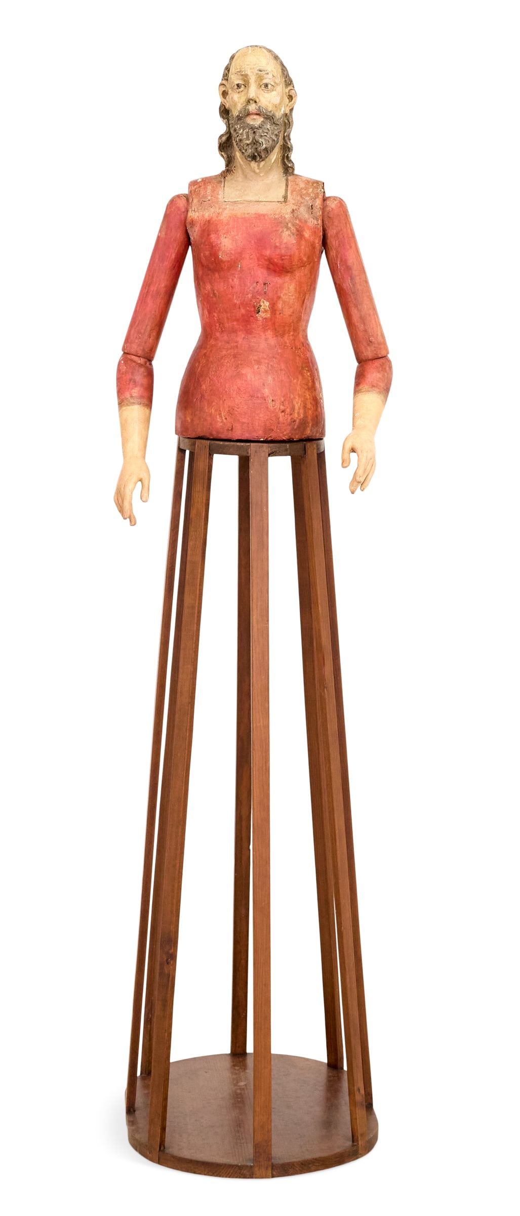 Latin American Processional Cage Doll Figure: Latin American Carved and Painted Processional Cage Doll Figure of St. Joseph 19th century and later, the well-carved head set into a body with articulated arms and hands, mounted on a cage-form base.
