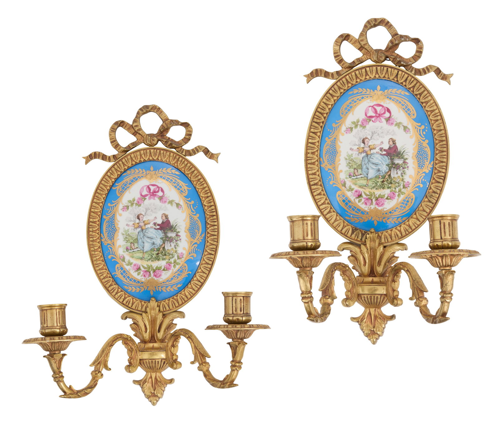 Pair of French Bronze and Porcelain Sconces: Pair of French Bronze and Porcelain Sconces 20th century, the oval backplates set with Sevres-style plaques, set into bronze surrounds with pierced bowknot crests, and set with pairs of leaf-molded ca