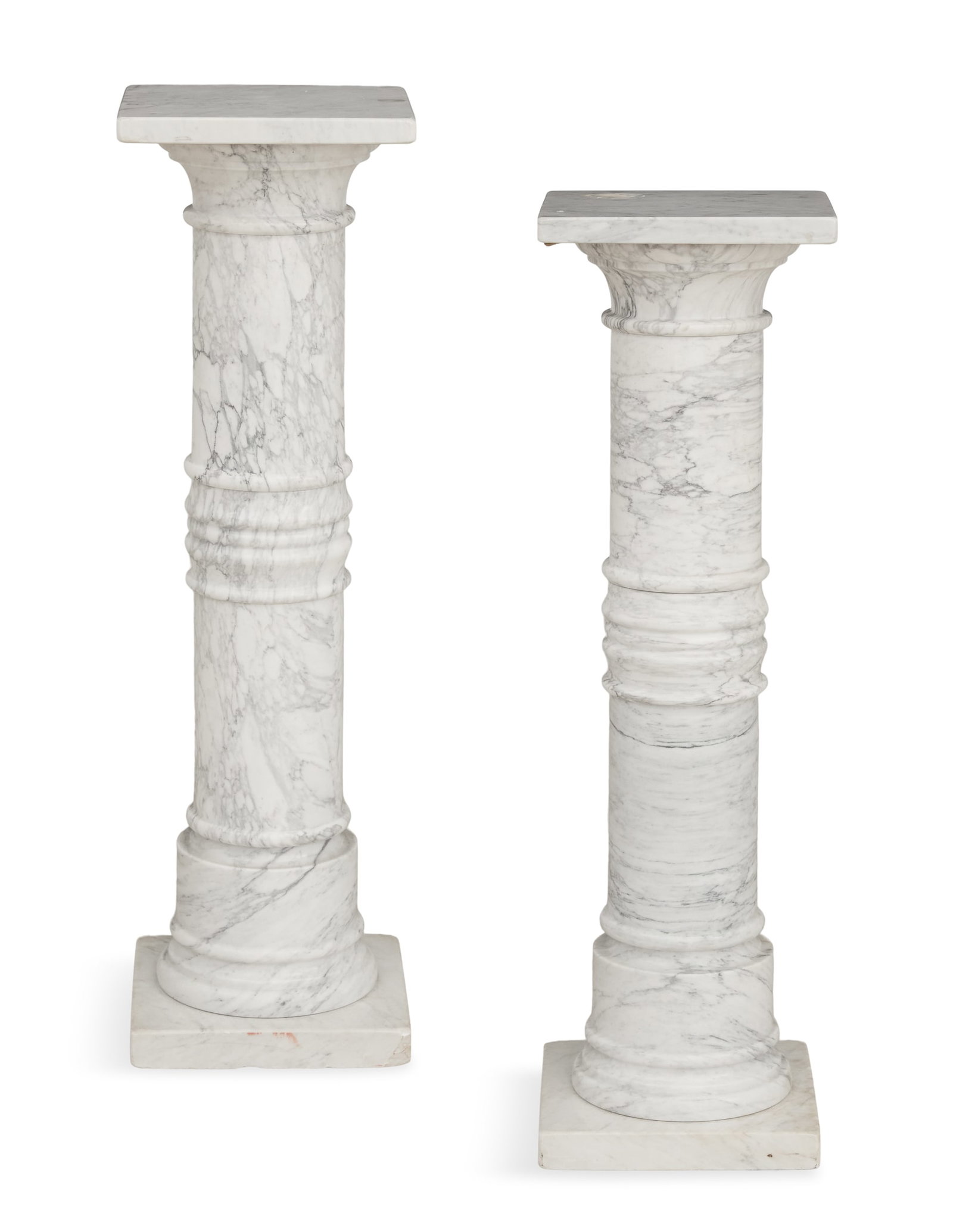 Pair of Polished White Marble Pedestals: Pair of Polished White Marble Pedestals contemporary, the square tops over column-form standards with cove-carved capitals, with central ring turning and cove-carved base molding. h. 39-1/4", w. 11-3/