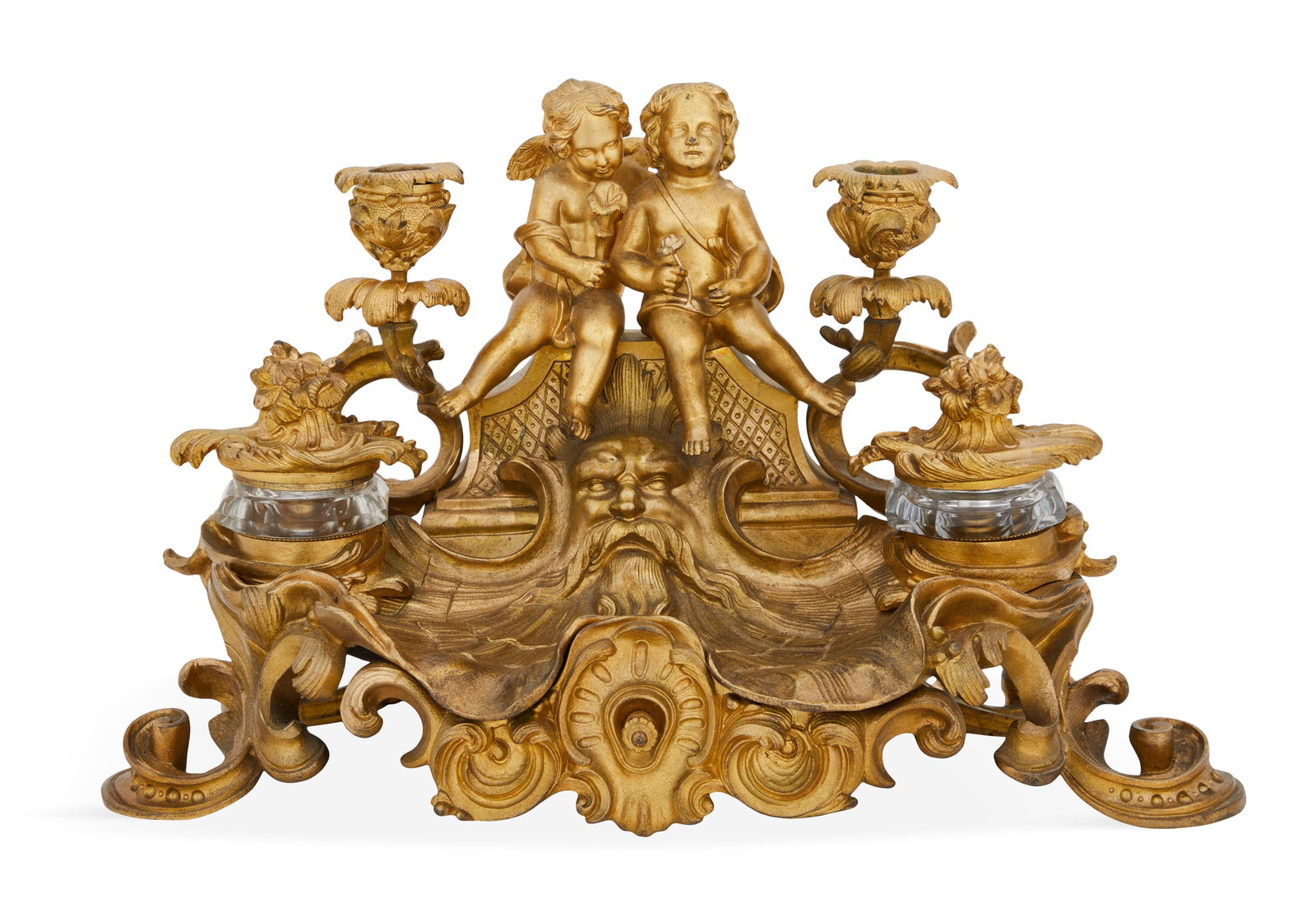 French Belle Epoque Gilt-Bronze Figural Encrier: French Belle Epoque Gilt-Bronze Figural Encrier fourth quarter 19th century, in the Louis XV taste, decorated with a cherub embracing a putto, each holding flowers, flanked by molded candle holders on