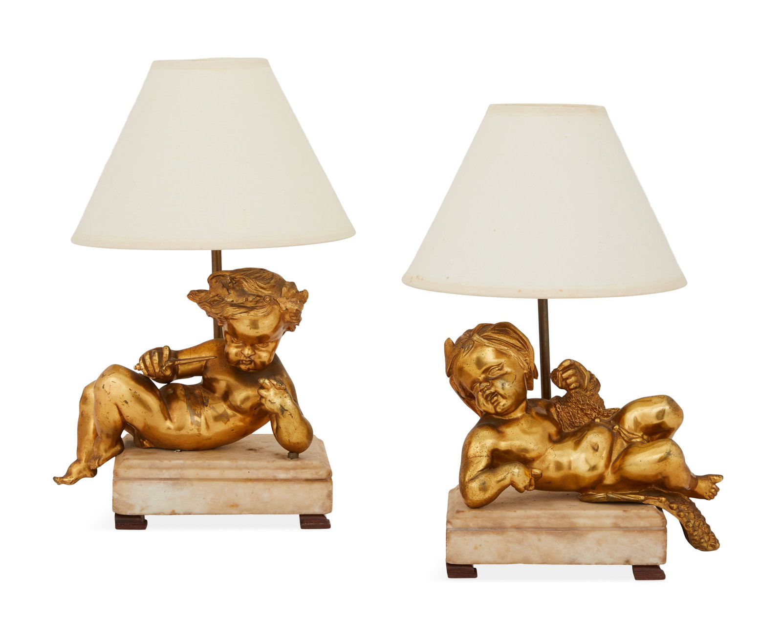 Belle Epoque Gilt-Bronze and Marble Putti: Pair of Belle Epoque Gilt-Bronze and Marble Figures of Putti fourth quarter 19th century, now mounted as lamps, one figure holding a dagger and the other a fishing net, on molded marble bases raised o