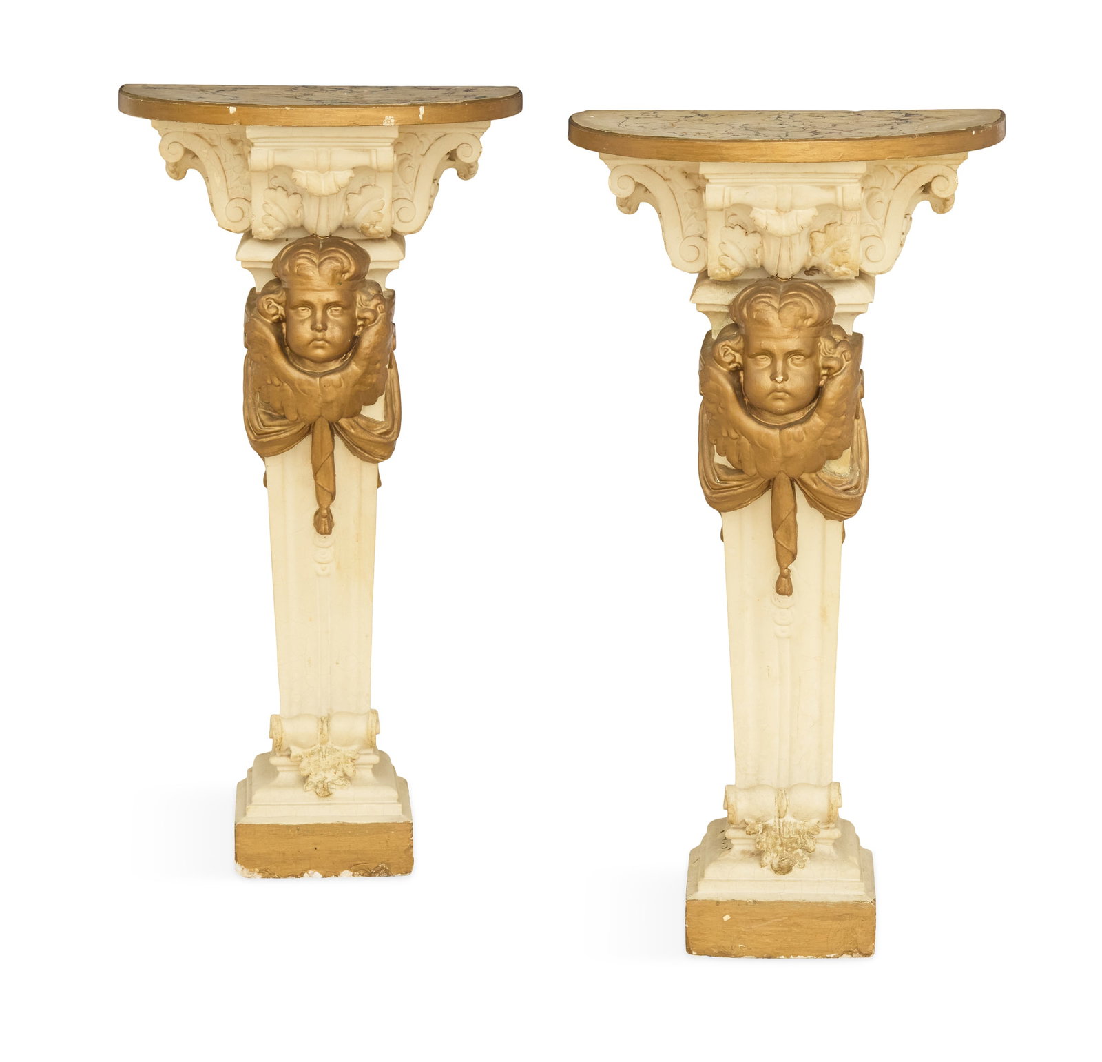 Pair of Parcel-Gilt Molded Plaster Pedestals: Pair of Parcel-Gilt Molded Plaster Pedestals first half 20th century, the faux-marbre tops supported on molded acanthus leaves, the bracket-form standards set with gilt winged putti heads. h. 42", w.