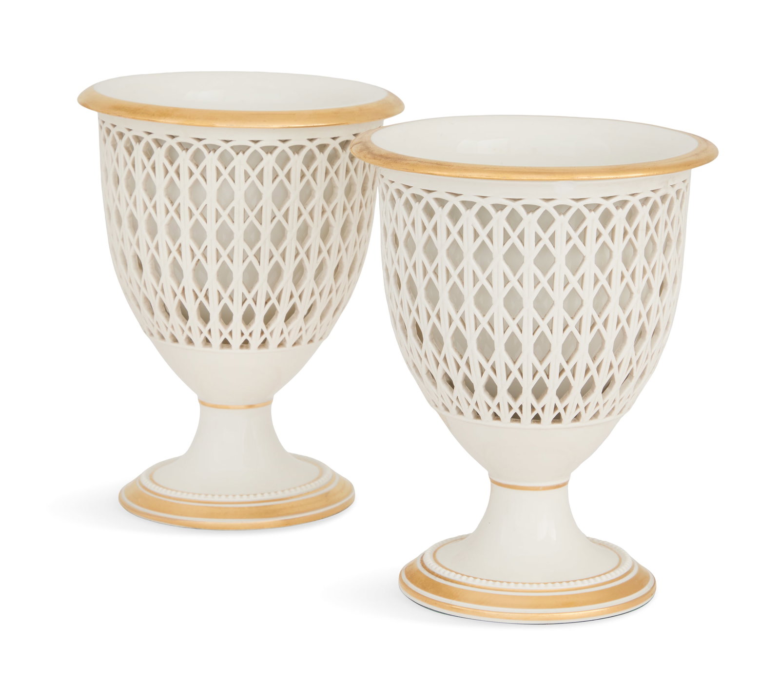 Pair of KPM "Schinkel" Baskets: Pair of KPM "Schinkel" Baskets 20th century, each delicately pierced porcelain basket on a gilt-trimmed foot, with a removable liner with an underglaze cobalt sceptre mark, designed by Karl Friedrich