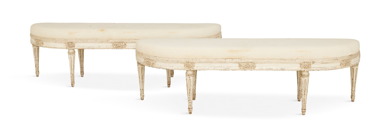 Pair of Louis XVI-Style Polychrome Benches: Pair of Louis XVI-Style Polychrome Benches 20th century, each with a long padded D-form seat above a paneled floral-carved frieze, raised on stop-fluted, tapered circular legs ending in toupie feet.