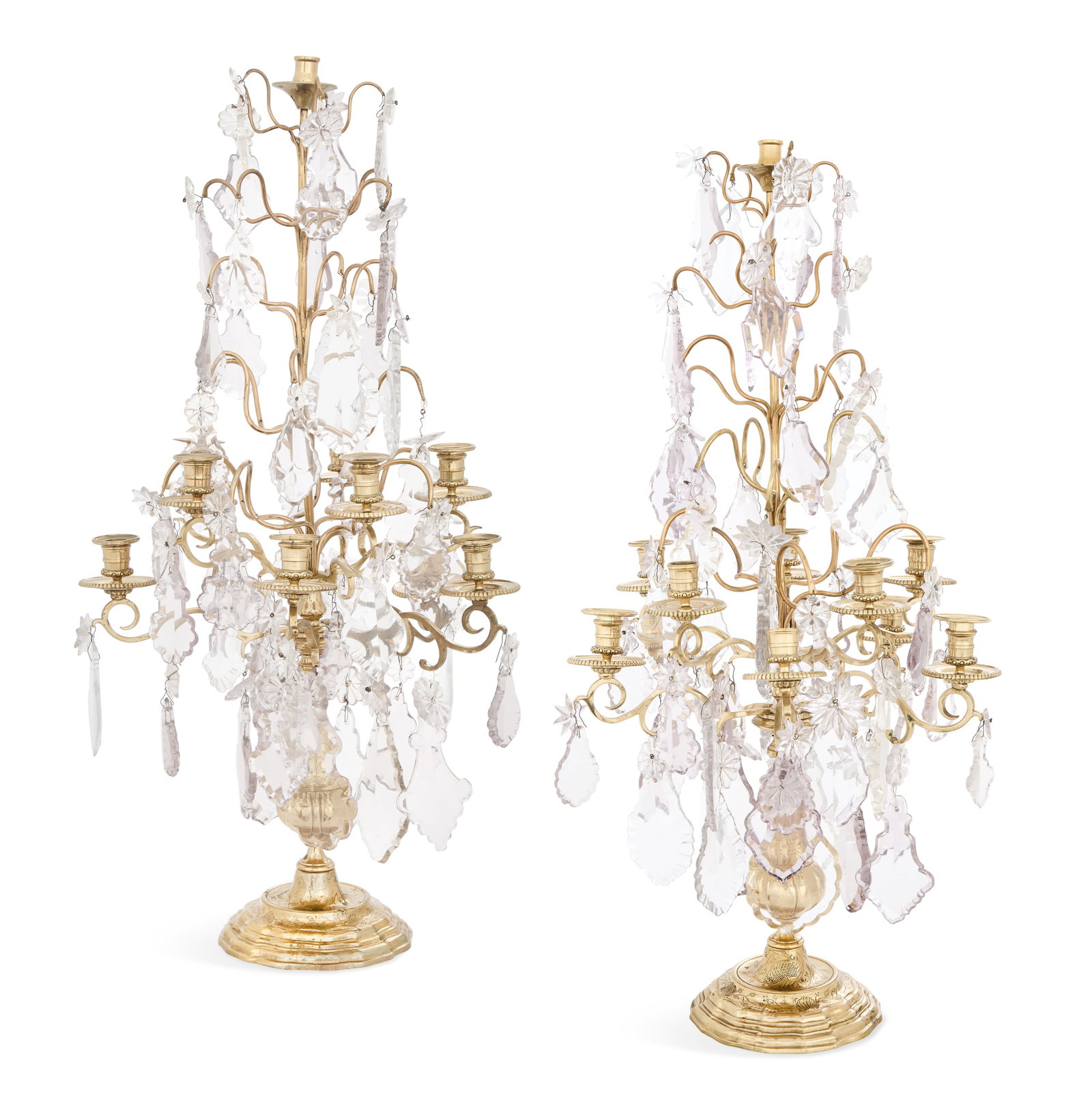 Pair of French Brass and Crystal Girandoles: Pair of French Engraved Brass and Crystal Girandoles mid-20th century, in the Louis XV taste, the cut-glass spire-form finials over two tiers of scrolled candle branches, set with candle cups and bead