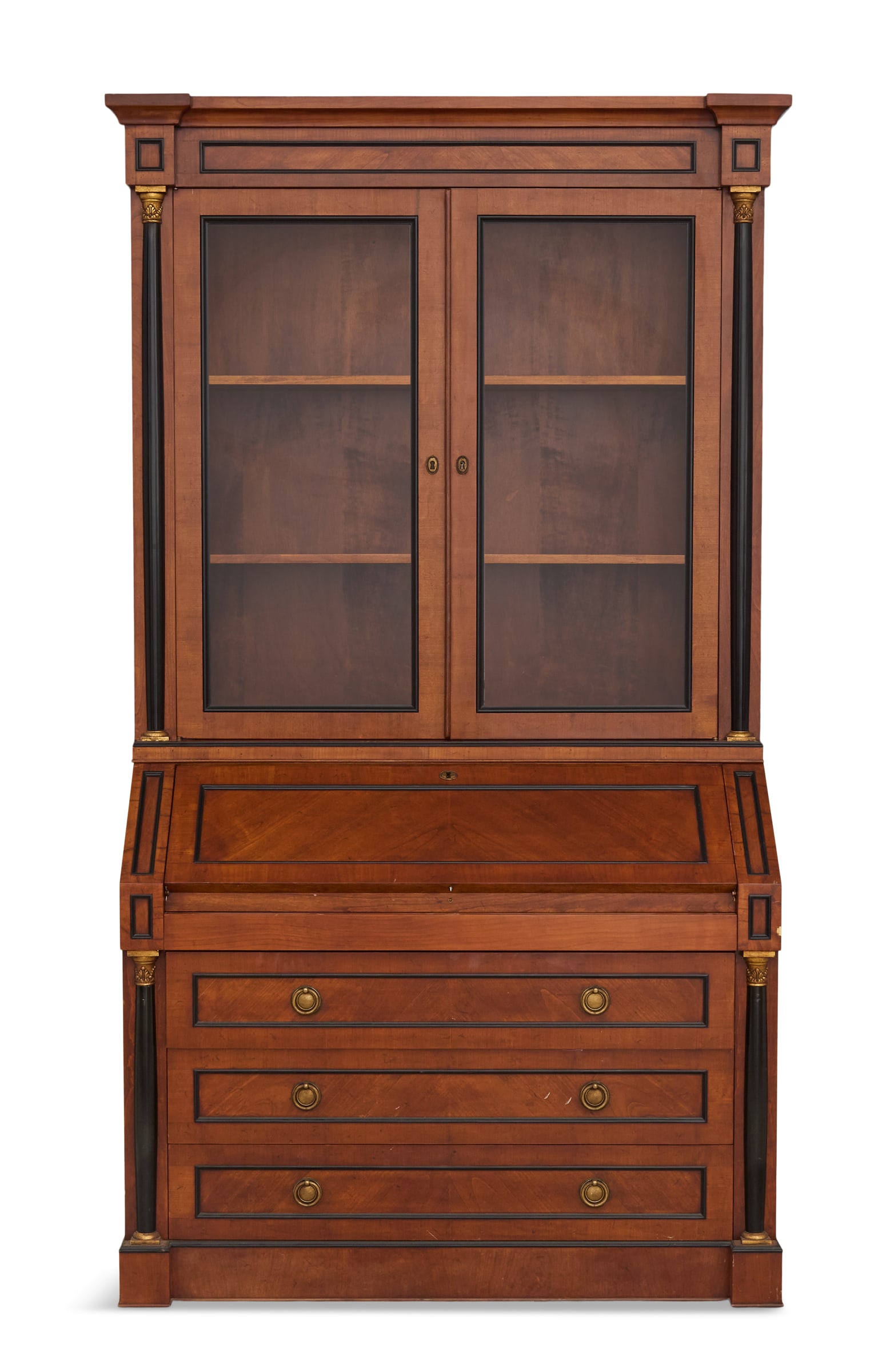 Empire-Style Fruitwood and Ebonized Secretary: Empire-Style Fruitwood and Ebonized Secretary 20th century, in two parts, the upper case with a pair of glazed doors, flanked by ebonized pilasters with gilt capitals, the base with a slant lid over t