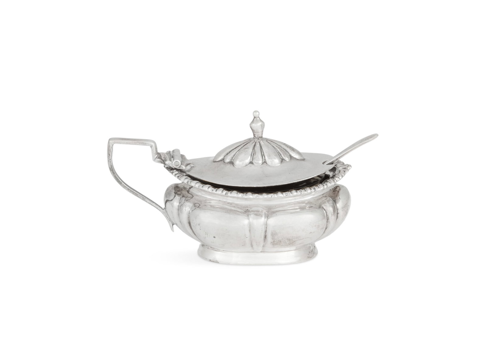 Edwardian Sterling Silver Mustard Pot: Edwardian Sterling Silver Mustard Pot hallmarked Sheffield, 1904-1905, by Cooper Brothers & Sons, in the Regency taste, the lobed body with gadrooned rim, squared handled and hinged lid opening to a f