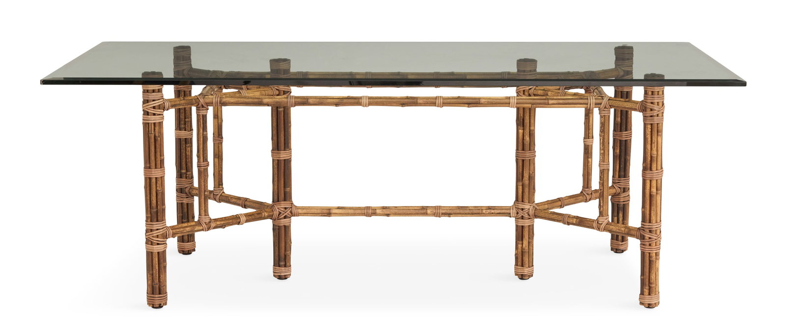 Bamboo and Plate-Glass Dining Table: Bamboo and Plate-Glass Dining Table 20th century, attributed to McGuire, the rectangular beveled plate-glass top over a base with clusters of bound bamboo stalks forming the legs, and joined by like b