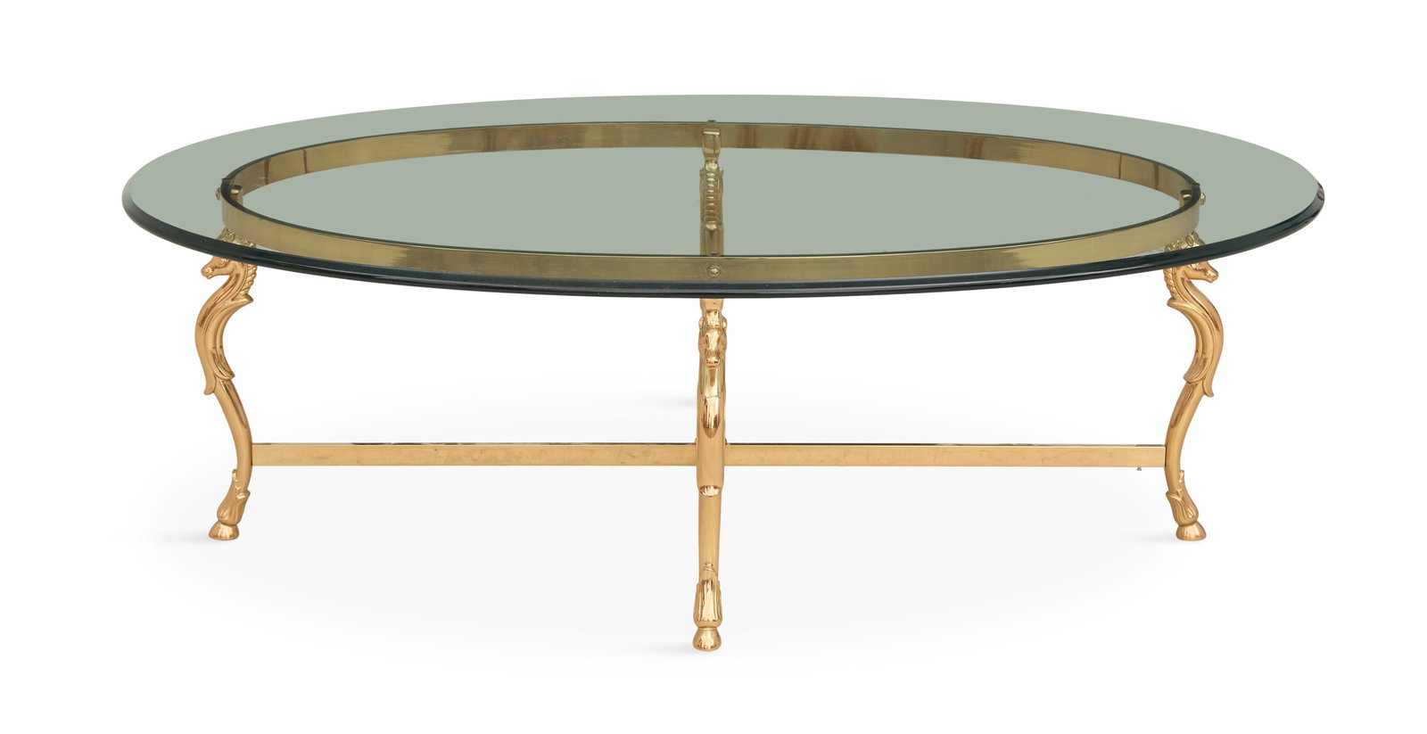 Polished Brass and Plate-Glass Oval Coffee Table: Polished Brass and Plate-Glass Oval Coffee Table in the neoclassical taste, the oval glass top over a conforming frame supported by four seahorse-form legs, joined by stretchers. h. 16-1/2", w. 52", d