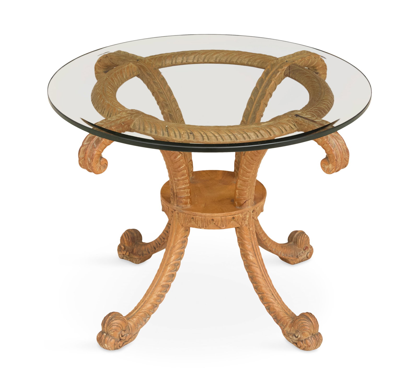 Beechwood and Plate-Glass Coffee Table: Prince-of-Wales Plume-Carved Beechwood and Plate-Glass Coffee Table 20th century, the circular beveled plate-glass top over a carved base with a circular rim and four down-curved legs, joined by a