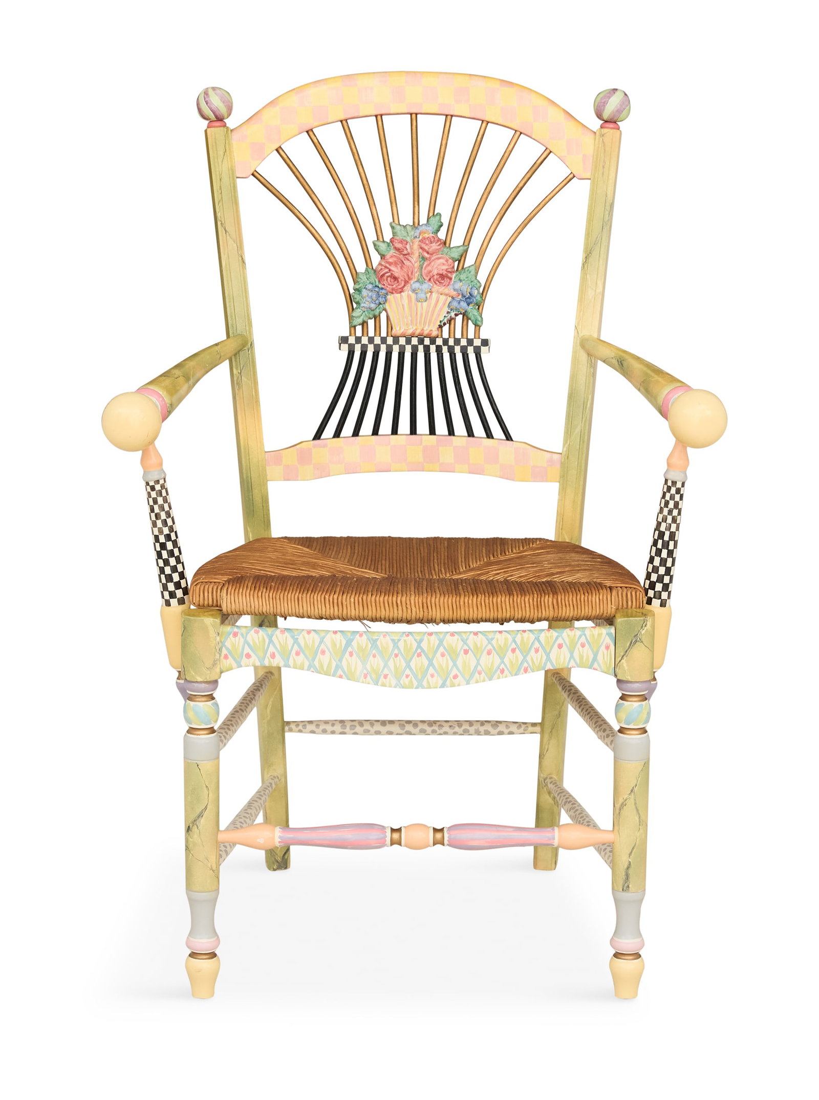 MacKenzie-Childs Polychrome Armchair: MacKenzie-Childs Polychrome Armchair highly decorated, the back with a central flower basket and thin radiating spindles, with a woven rush seat and raised on turned legs. h. 39", seat h. 17", w. 28",