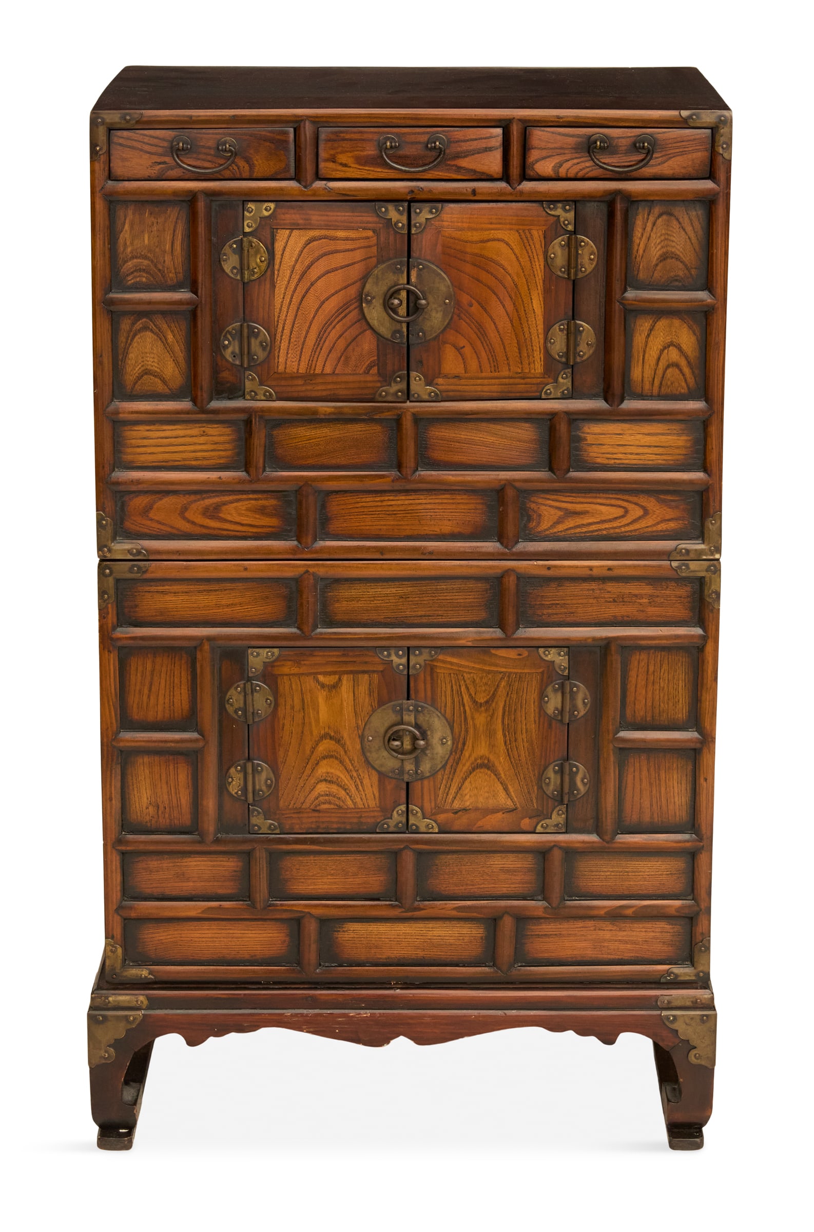 Korean Brass-Mounted Nong: Korean Brass-Mounted Nong 20th century, the paulownia wood nong comprised of two stacking chests, each with a pair of doors, the facade decorated with panels of applied molding, on a matching base wit