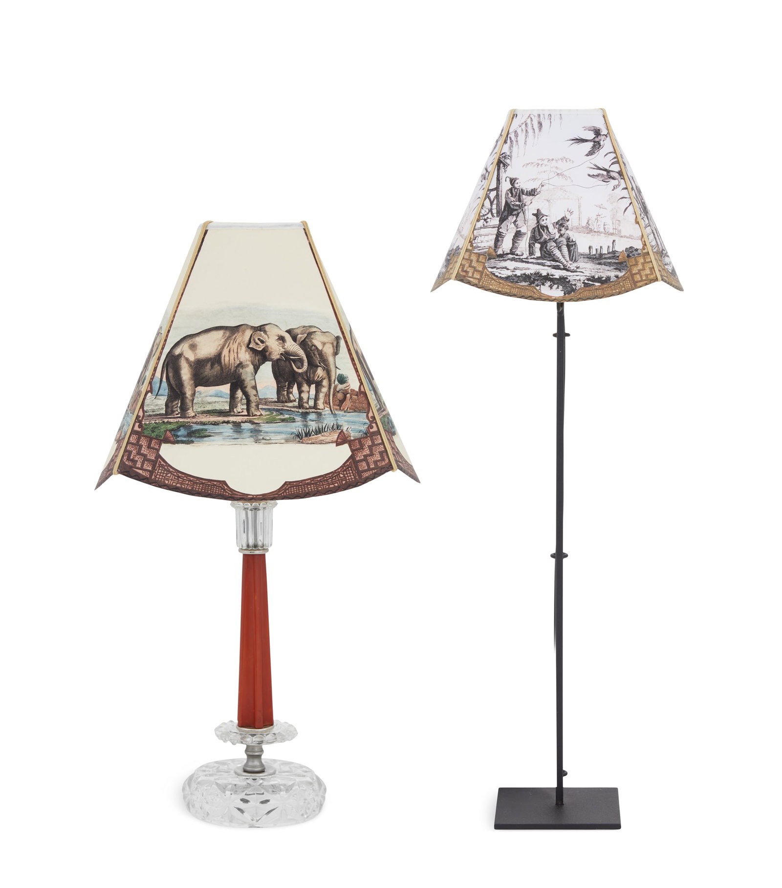Two Lamps with Joanna Wood Shades: Two Lamps with Joanna Wood Shades one example, second quarter 20th century, with a shade decorated with elephants, on an Art Deco-molded glass boudoir lamp with a celluloid standard, h. 17", w. 10-1/2