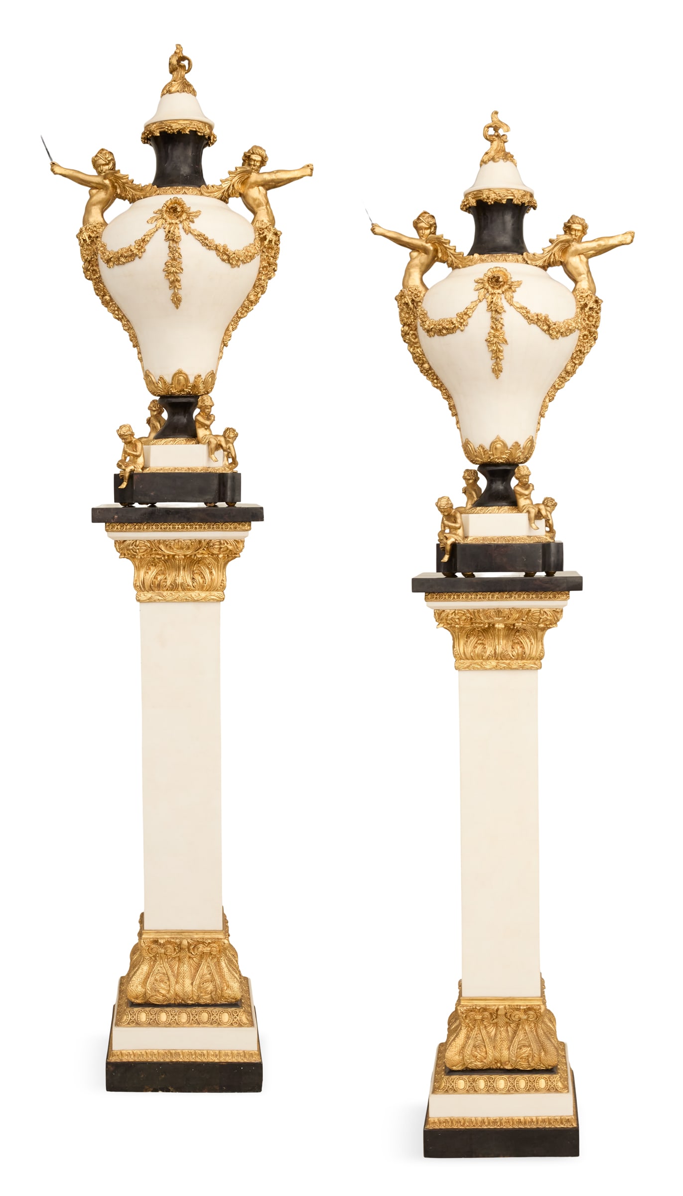 Pair of Gilt Resin and Stone Urns on Pedestals: Pair of Large Gilt Resin and Stone Urns on Pedestals contemporary, the inverted pear-form urns with white bodies and black necks and bases, with mermaid handles and flower medallions, supporting swags