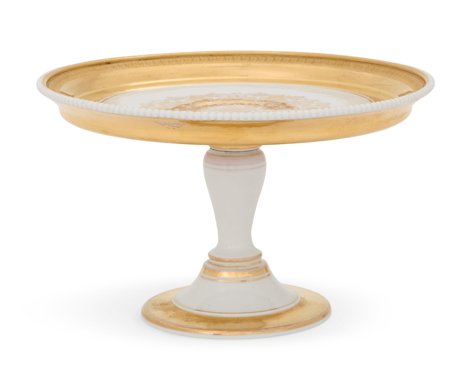 KPM Porcelain Dessert Stand: KPM Porcelain Dessert Stand ca. 1847-1849, with a beaded edge and molded gilt borders, surrounding a gilt center medallion, on a vasiform stand and marked on the base. h. 6-1/4", dia. 10" Provenance: 