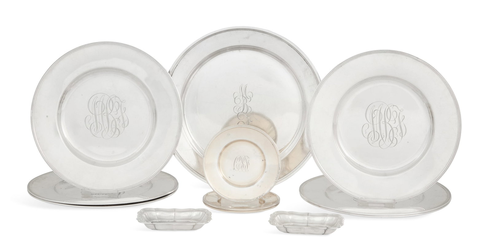American Sterling Silver Small Tableware: Twelve Pieces of American Sterling Silver Small Tableware first half 20th century, including: six Gorham bread-and-butter plates, 1912, circular with reeded rim, monogrammed "MBF", dia. 6-1/4"; a Whit