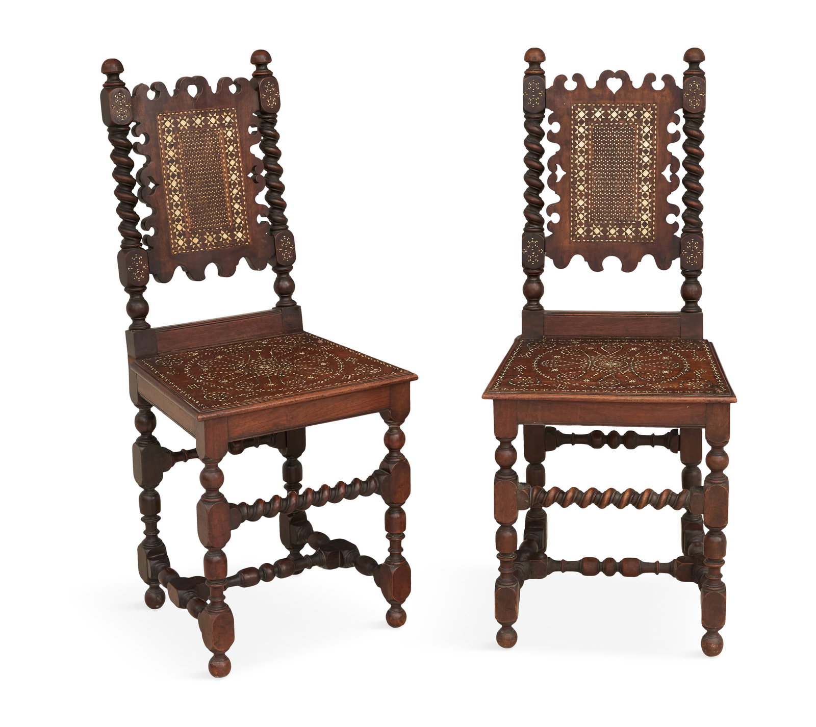 Pair of English Bone-Inlaid Mahogany Side Chairs: Pair of English Bone-Inlaid Mahogany Side Chairs 19th century, each with a shaped back with a central inlaid panel, and spiral-twist back posts, legs and stretchers, the seat with inlaid circular moti