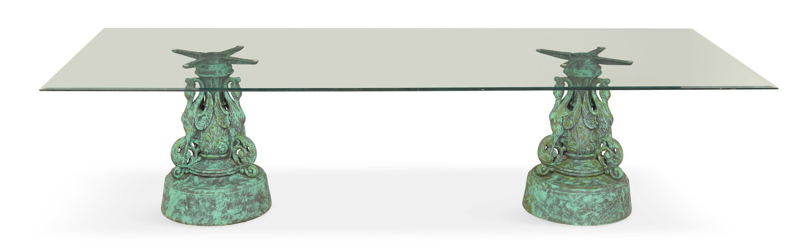 Plate-Glass and Patinated Aluminum Dining Table: Plate-Glass and Patinated Aluminum Dining Table contemporary, the large rectangular plate-glass top with a beveled edge and set on a pair of cast-aluminum pedestals with three egrets surmounted to eac
