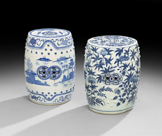 Two Chinese Blue and White Garden Seats: Two Chinese Blue and White Garden Seats, one decorated in a Canton style with willow trees and a figure on a bridge, h. 18-1/2", dia. 13", and the other decorated with peonies and dark blue leaves, h.