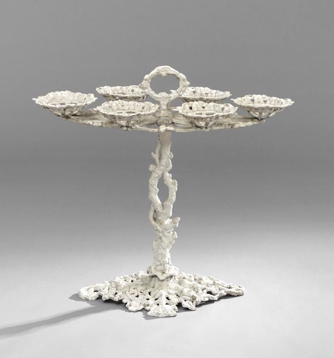 Rare Cast Iron Tree-Form Plant Stand: Rare Cast Iron Tree-Form Plant Stand, third quarter 19th century, having a tree trunk standard supporting a branch-form shelf with six pot holders, h. 30", w. 33", d. 18".