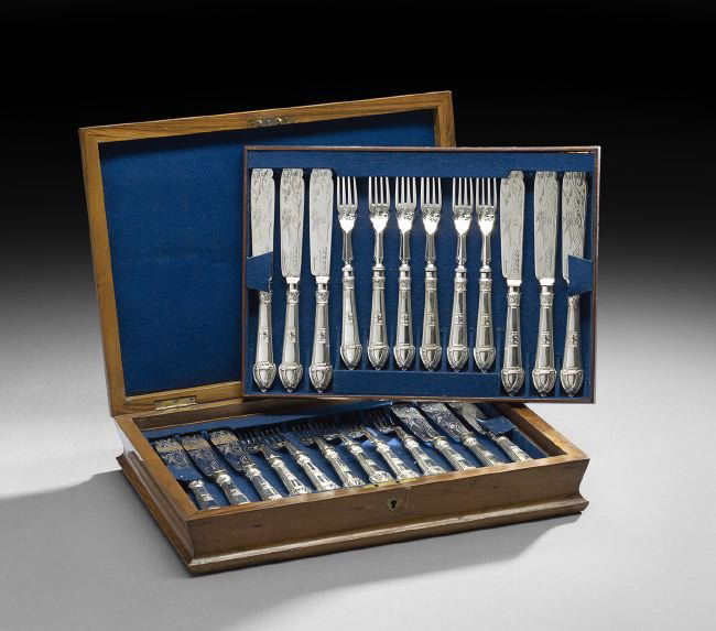 Victorian Cased Silverplate Fish Service: Victorian Cased Thirty-Six-Piece Silverplate Fish Service, the design registered May 22, 1874, by William Hutton & Sons, Sheffield, including eighteen fish forks, l. 7-3/4", and eighteen fish knives,